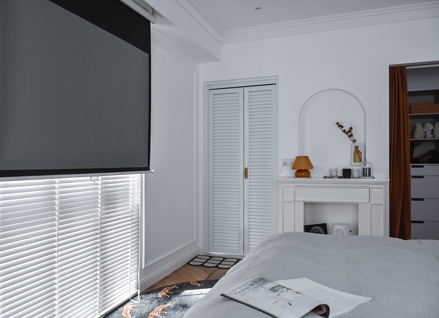 From Ordinary to Extraordinary: Our Master Bedroom Makeover - White bedroom with modern design, gray carpet with orange