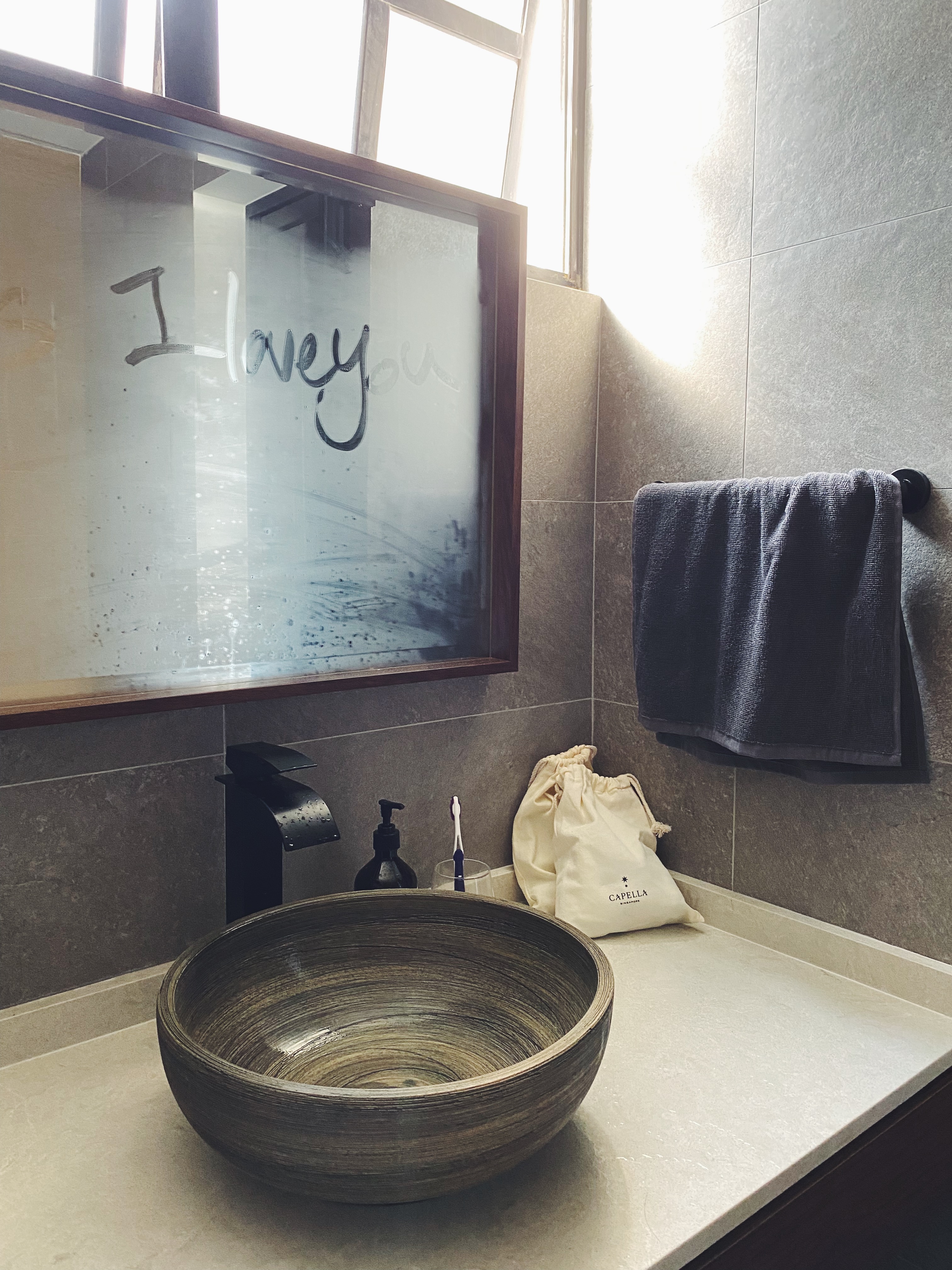 Love walnut wood in bathrooms! - glass, mirror, frosted, "I love you" text, bathroom, sink, wooden bowl, beige countertop