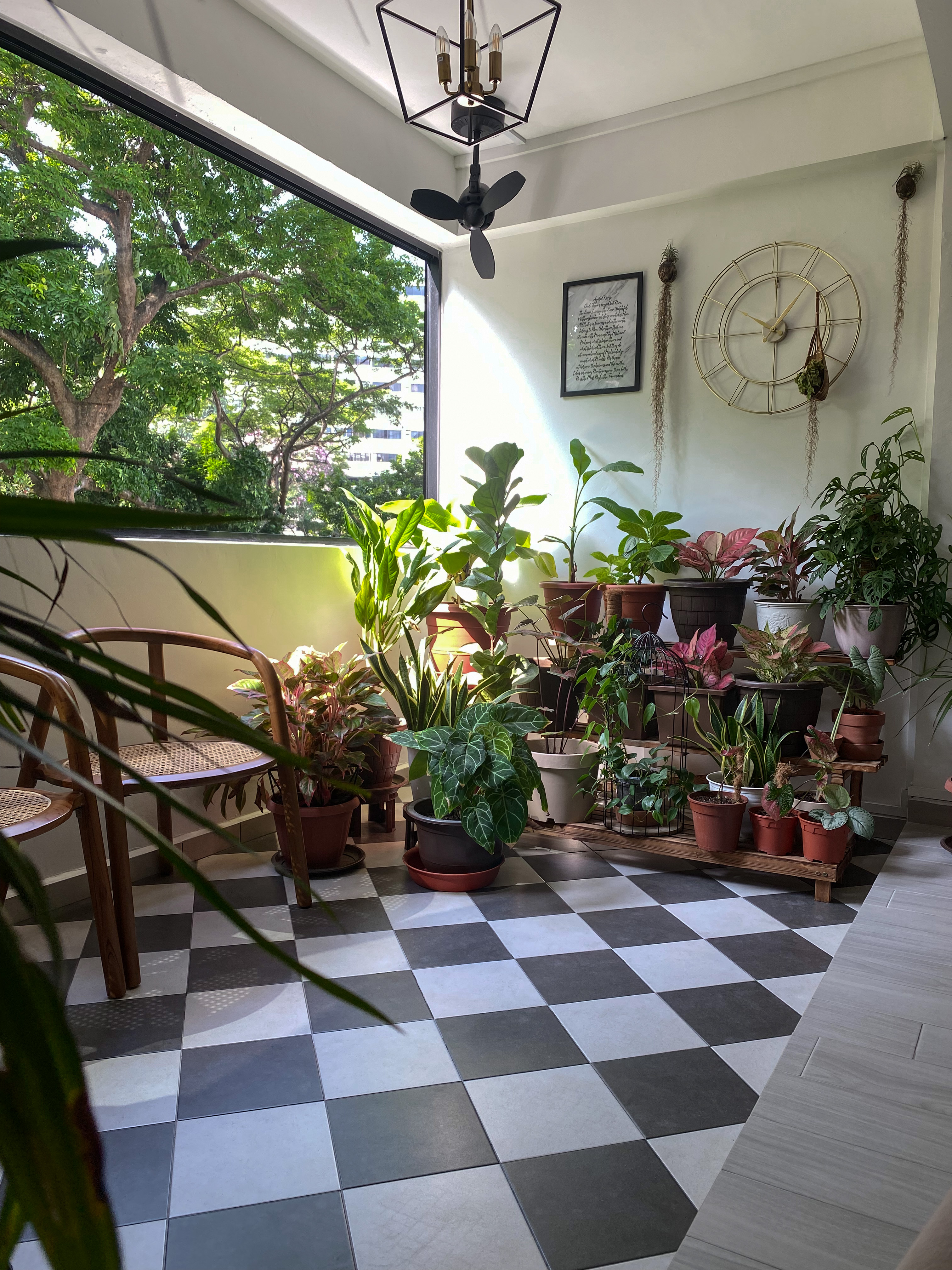 The Best of Bright & Airy Balcony Spaces to Rest and Relax - Green plants, black and white checkered floor, large window
