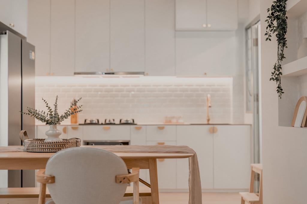 A Simple Kitchen For All Your Possible Needs  - Modern kitchen with minimalist design, white cabinets, stainless steel