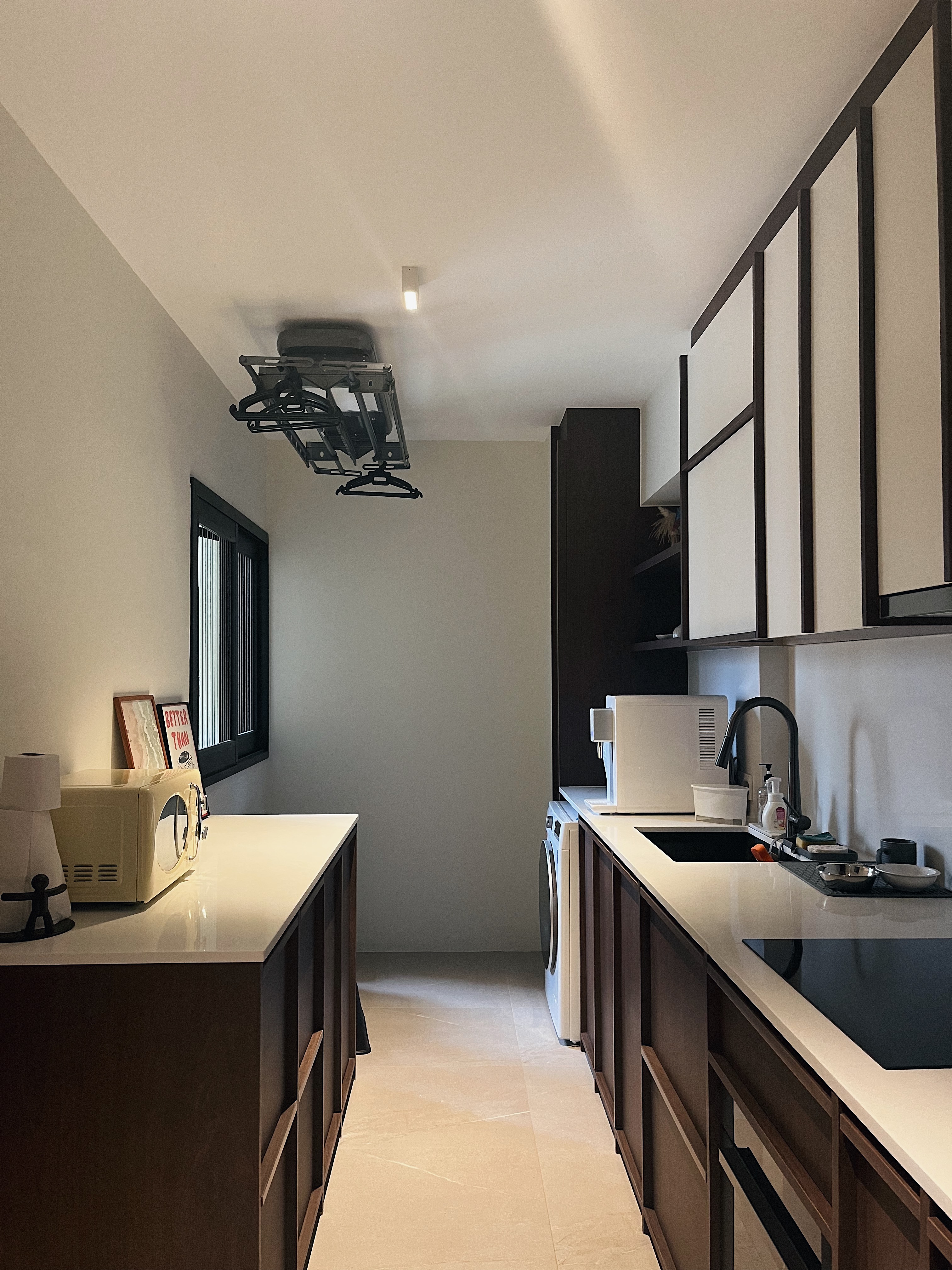 Spacious & Airy Kitchen For All Your Cooking Needs  - Modern kitchen with sleek design, minimalist decor, neutral color