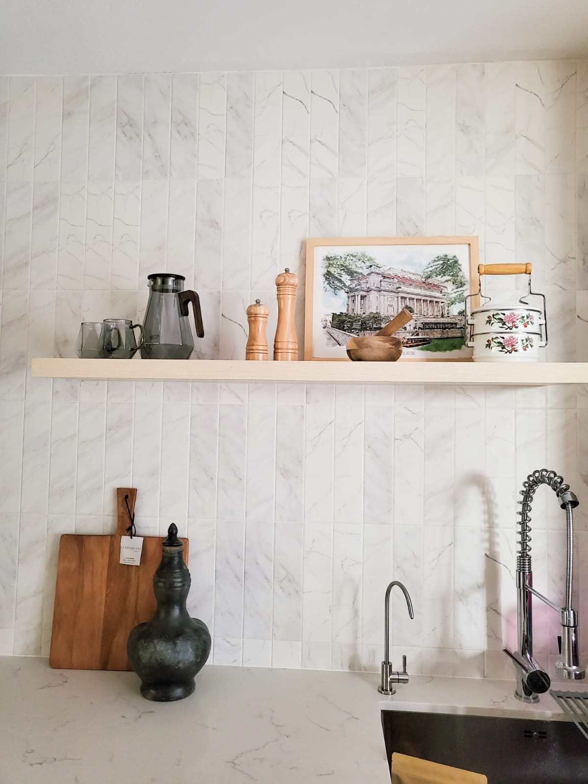 Combining the best of Kitchen Spaces and the English Countryside  - White marble tiles, kitchen countertop, modern sink
