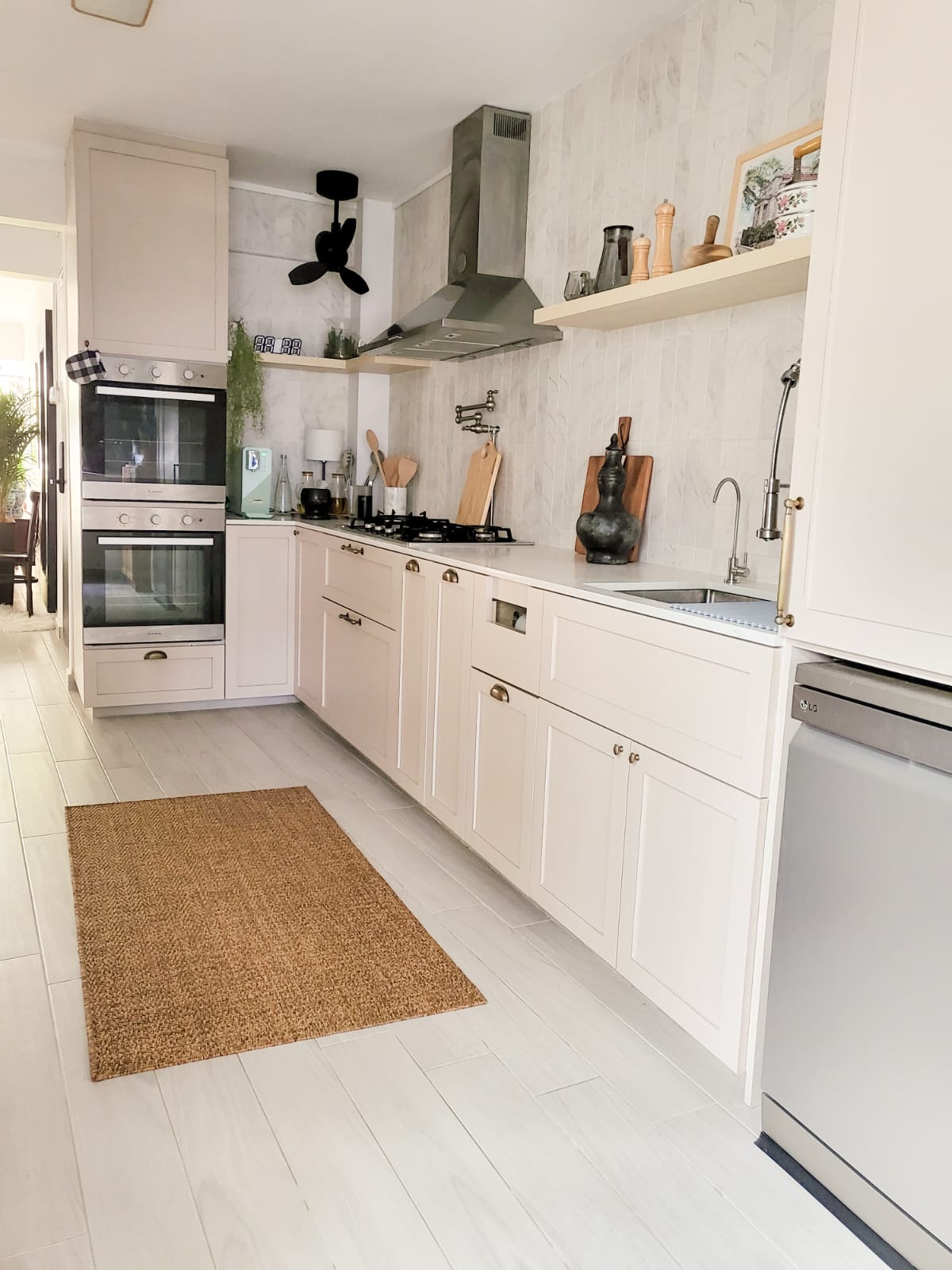 Combining the best of Kitchen Spaces and the English Countryside  - White kitchen with built-in appliances, stainless steel