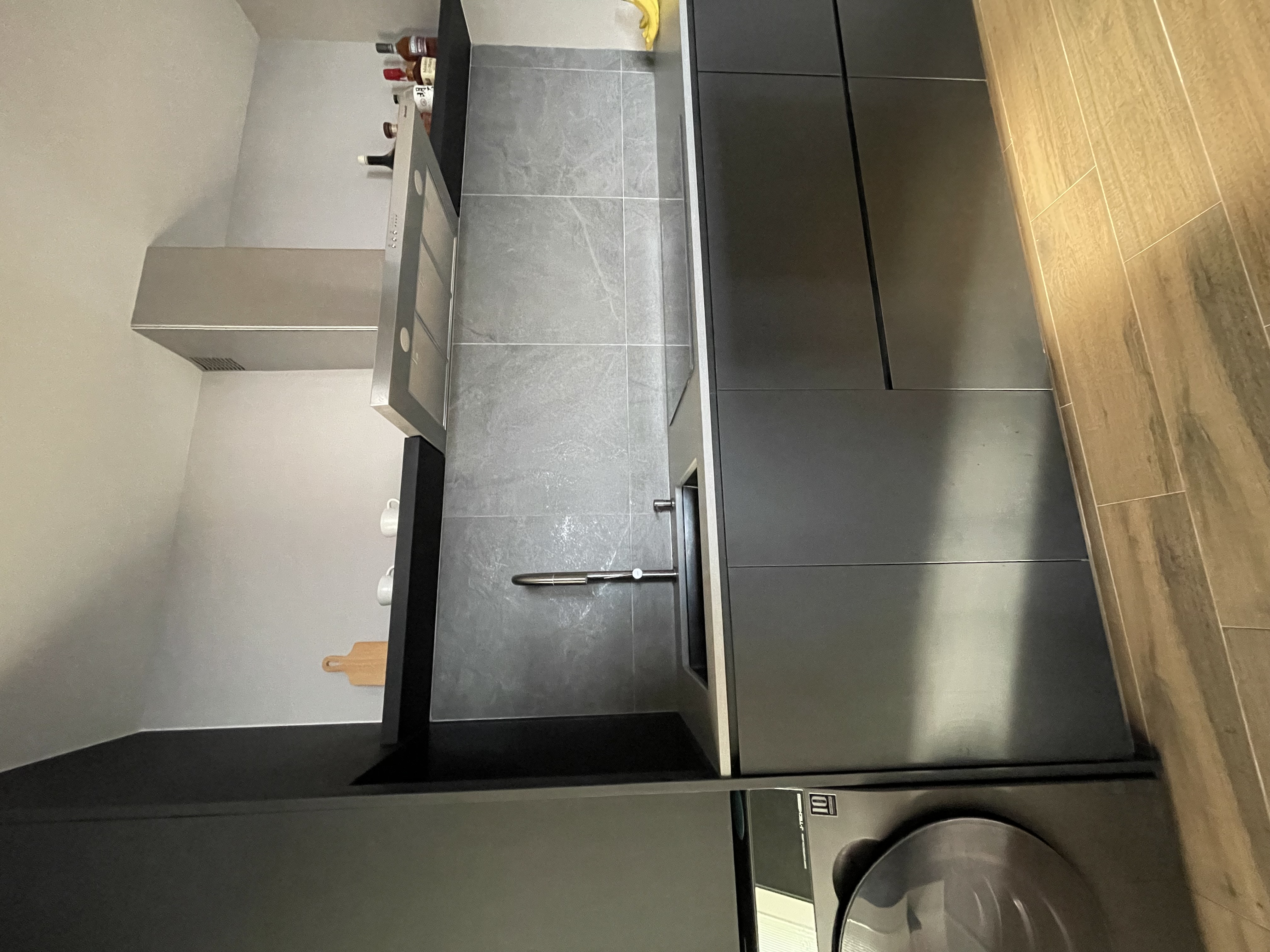 A-modern-dark-themed-kitchen-