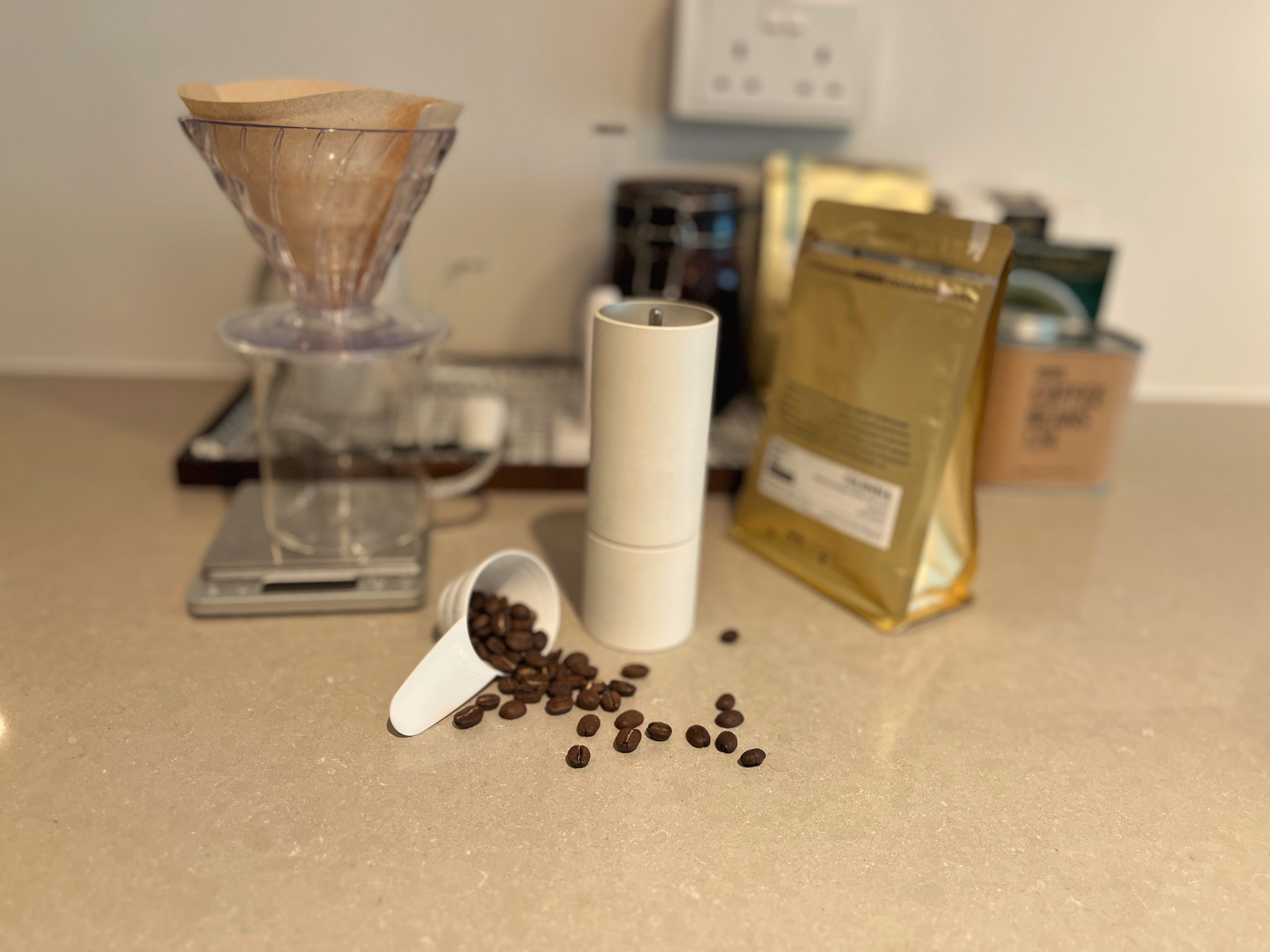 Light, Scent, Sound for the Ultimate Cosy-trinity - coffee beans, coffee grinder, coffee beans on countertop, coffee beans in