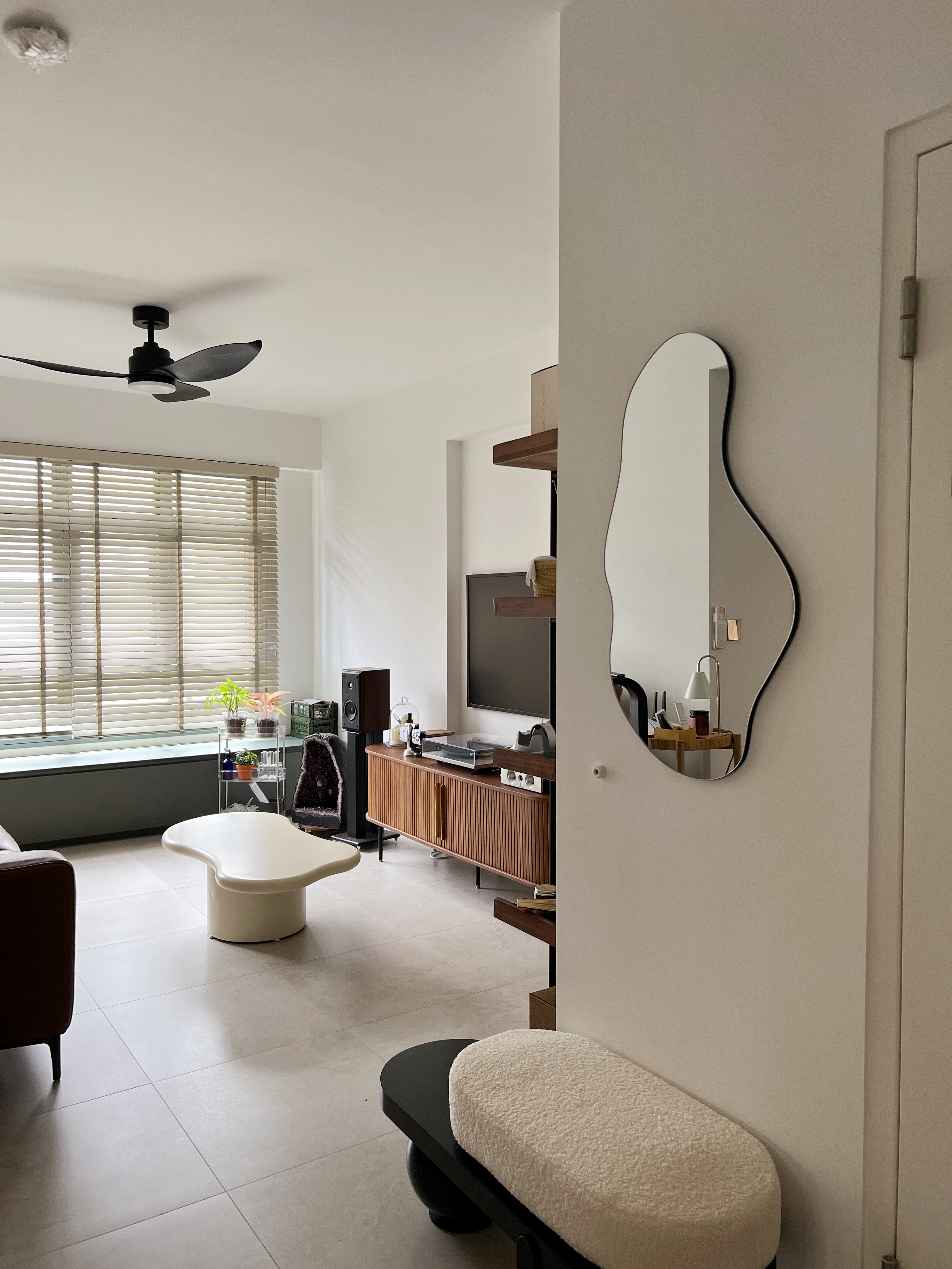 Our Simple but Cozy Living Room  - Modern minimalist living room, sleek ceiling fan, large window with blinds, cozy seating