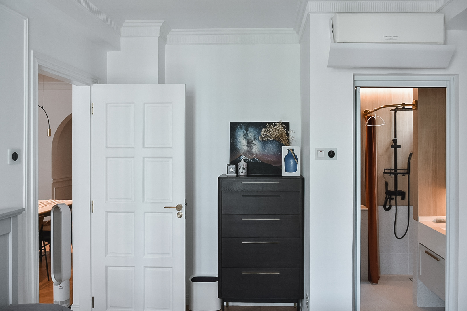 Guest Room: A Colorful Retreat - White elegantly designed room, minimalist decor, black dresser, abstract painting, modern