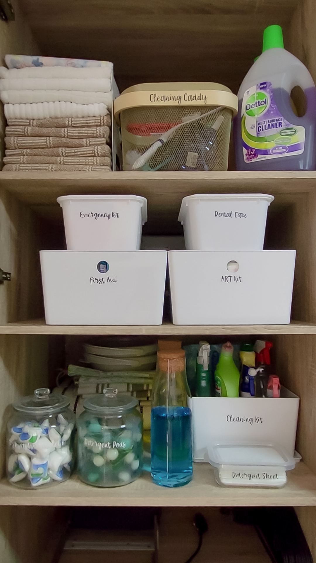 Fusing Aesthetics & Function For All Your Kitchen Storage Needs  - Cleaning supplies, neatly organized, towels, dish soap
