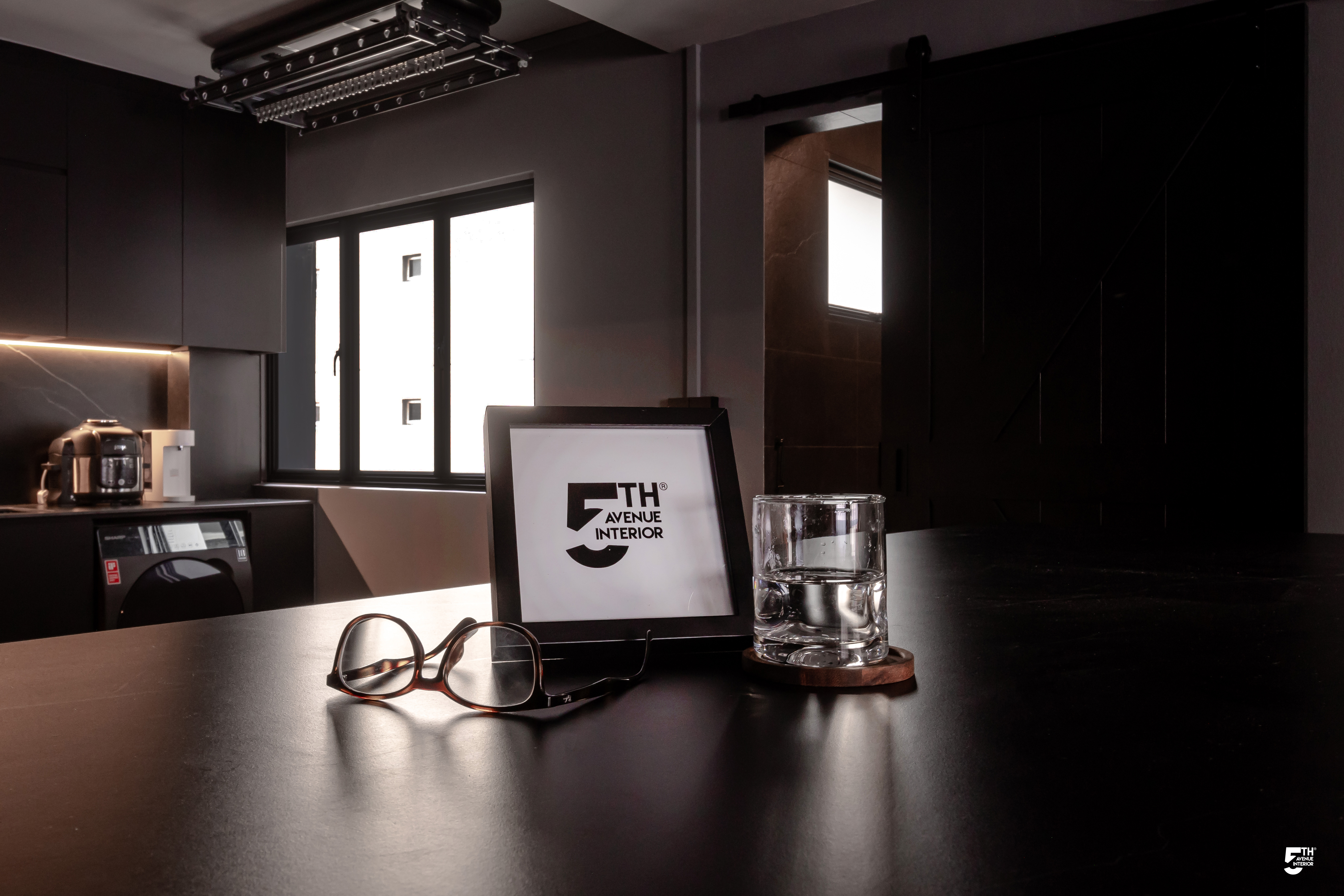 Dark and Modern Kitchen - smartphone, glasses, modern kitchen, black cabinets, window, indoor plant, coffee maker, digital