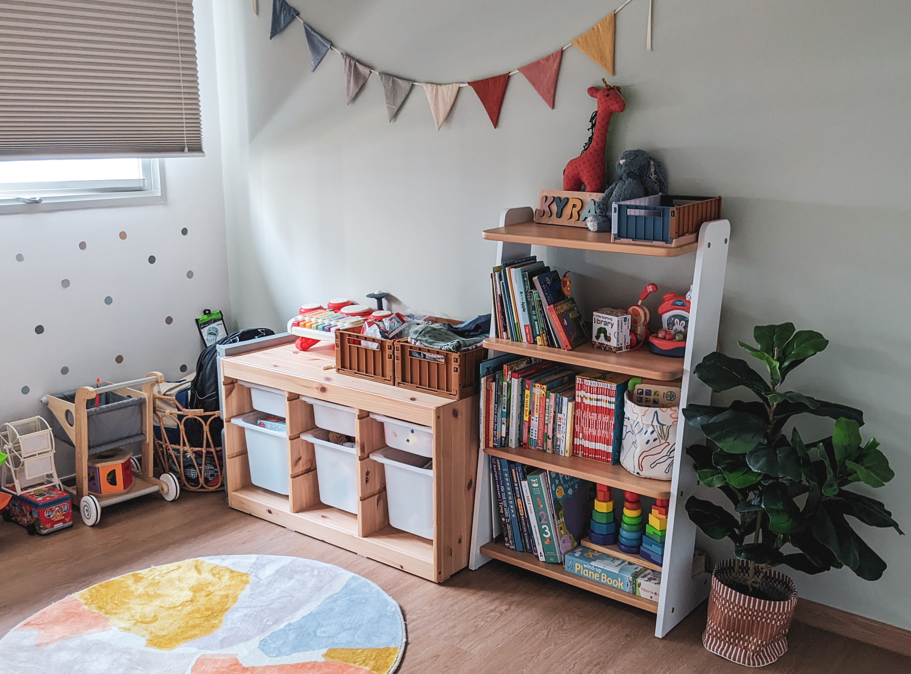 Child's Play | Flourish. Create. Connect. - Children's room, cozy corner, wooden furniture, bookshelf, colorful toys