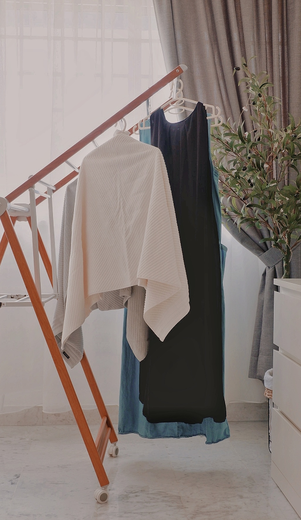 Favourite Purchases For The Home  - white ribbed sweater, black dress, light blue skirt, wooden ladder, gray coat, white