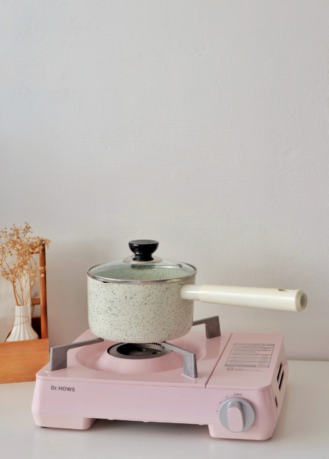 Favourite Purchases For The Home  - Futuristic pink electric stove, Dr. Hows brand, speckled pot on stove, modern kitchen