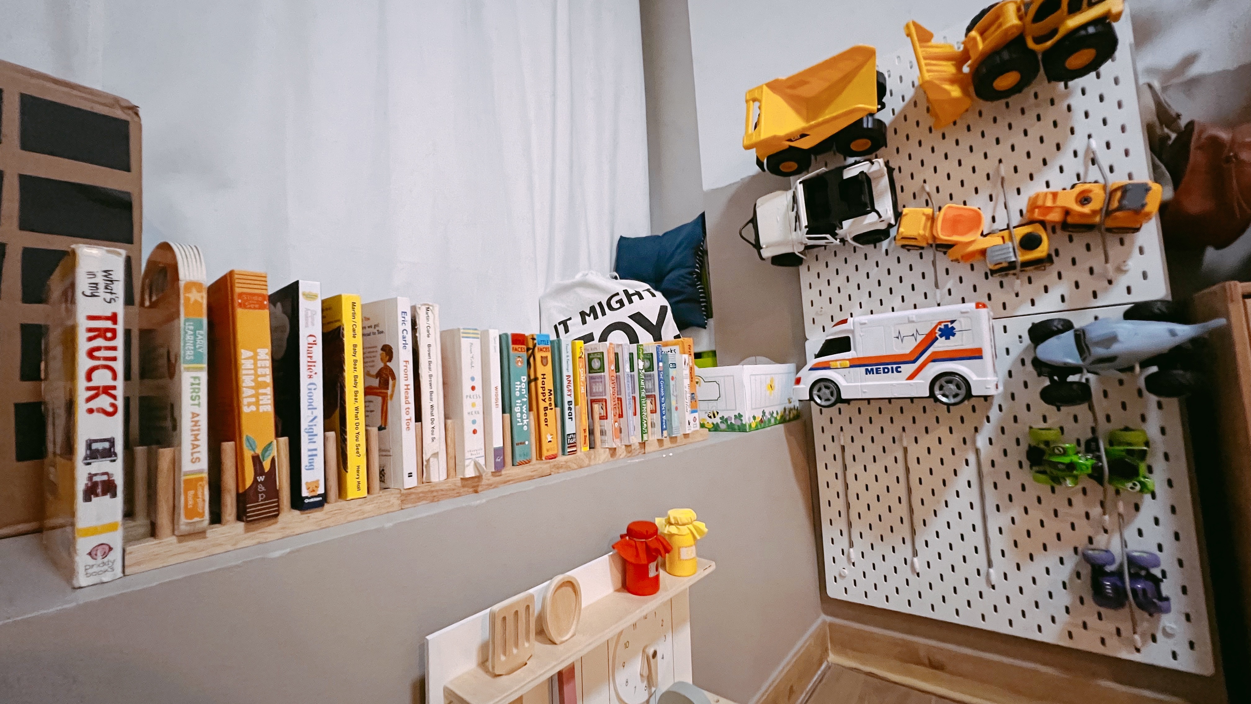 Welcome To Our Two Year Old’s Crib! - Children's bookshelf, toy vehicles, toy dump truck, toy construction vehicles, toy