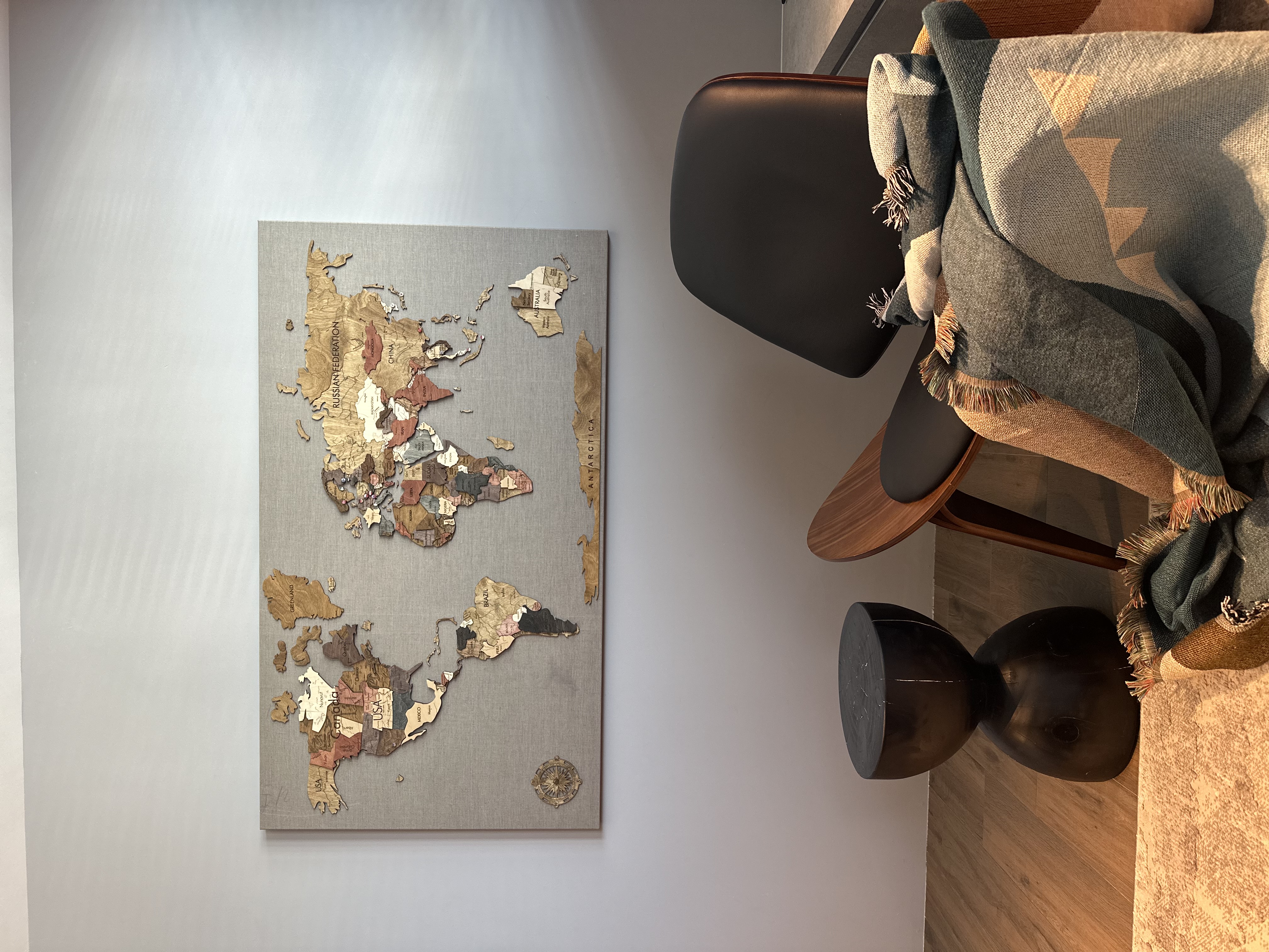 Not one but two modern contemporary cozy corners 😌 - wooden floor, modern furniture, abstract map, artistic wall art