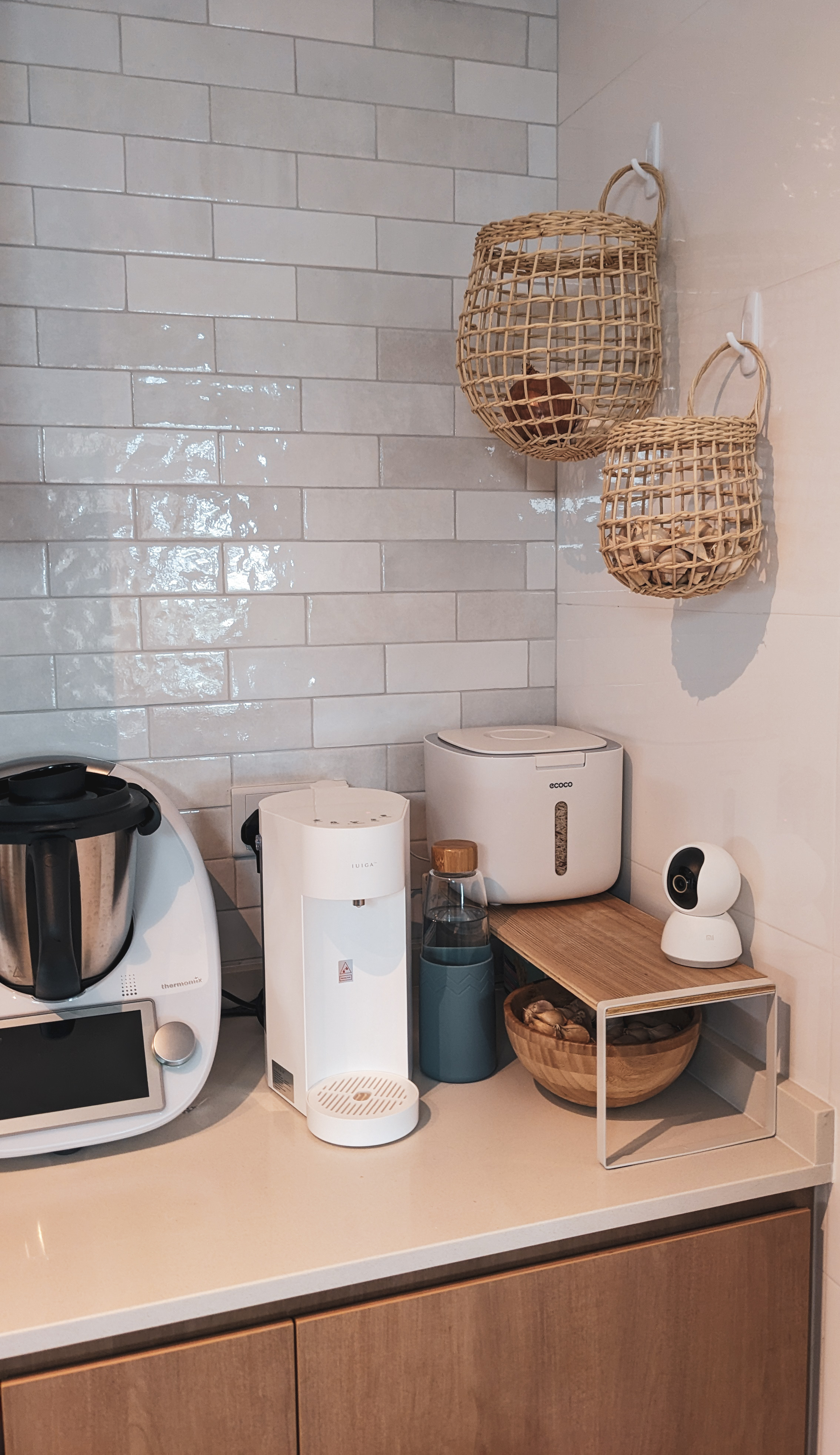 Creating Statements | Every detail counts - White tiled kitchen counter, modern appliances, electric kettle, coffee machine