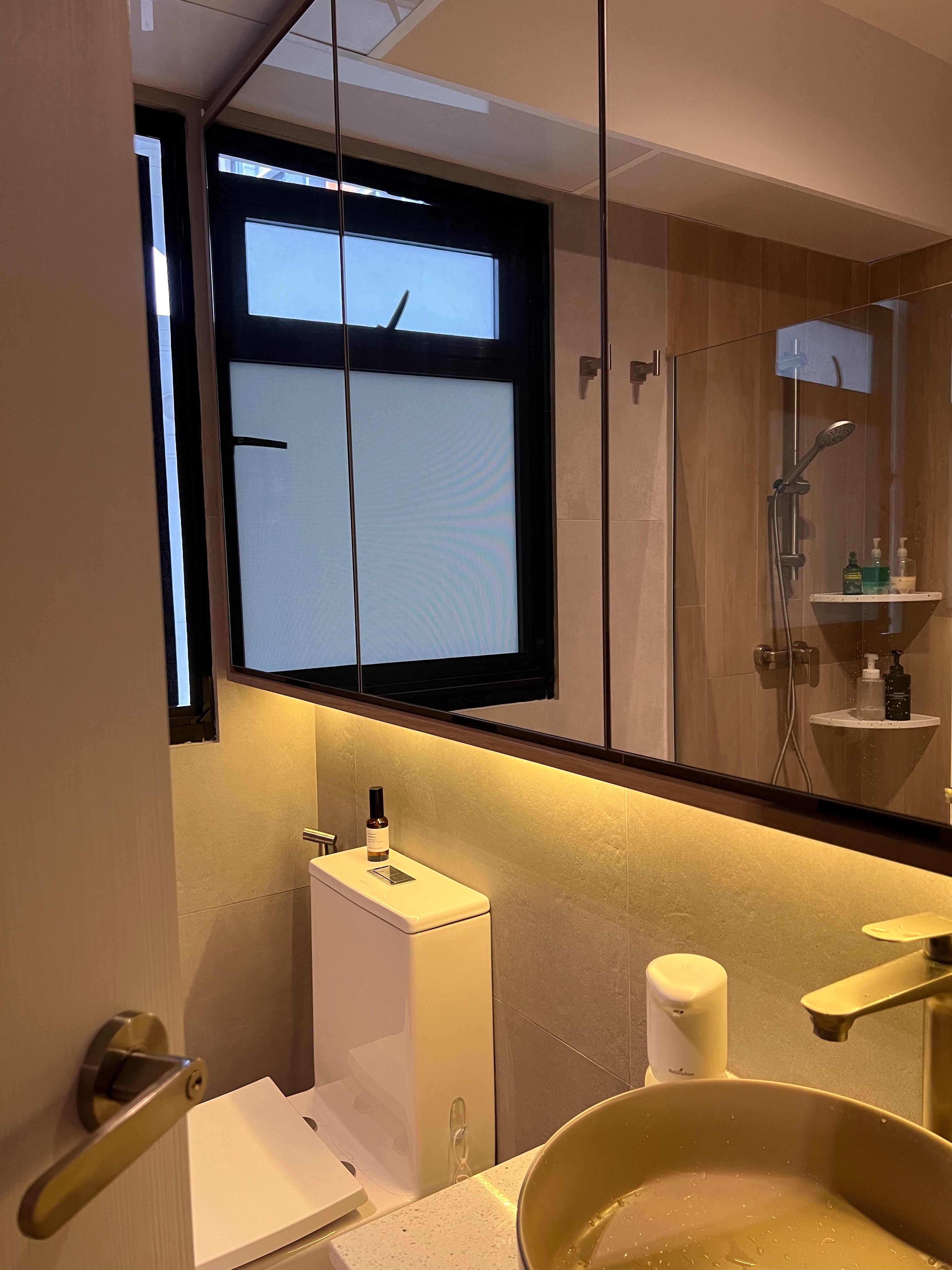 6 reno decisions we love in our wabi-sabi inspired home - Modern bathroom interior, sleek design, large window, wooden