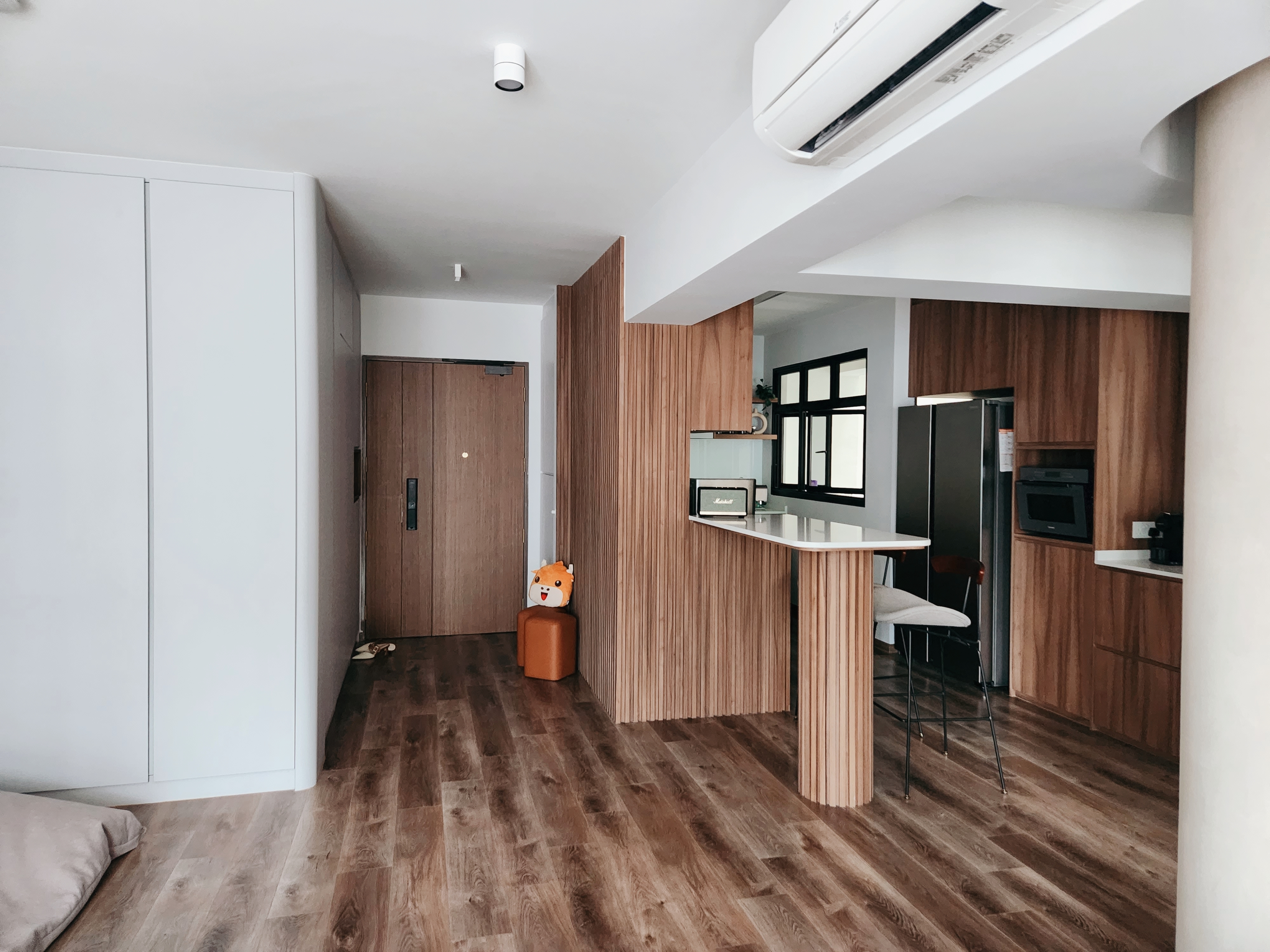 4 Room Warm, Curvy Contemporary Abode | Reno under $53k  - Wooden kitchen cabinetry, modern appliances, wooden countertops