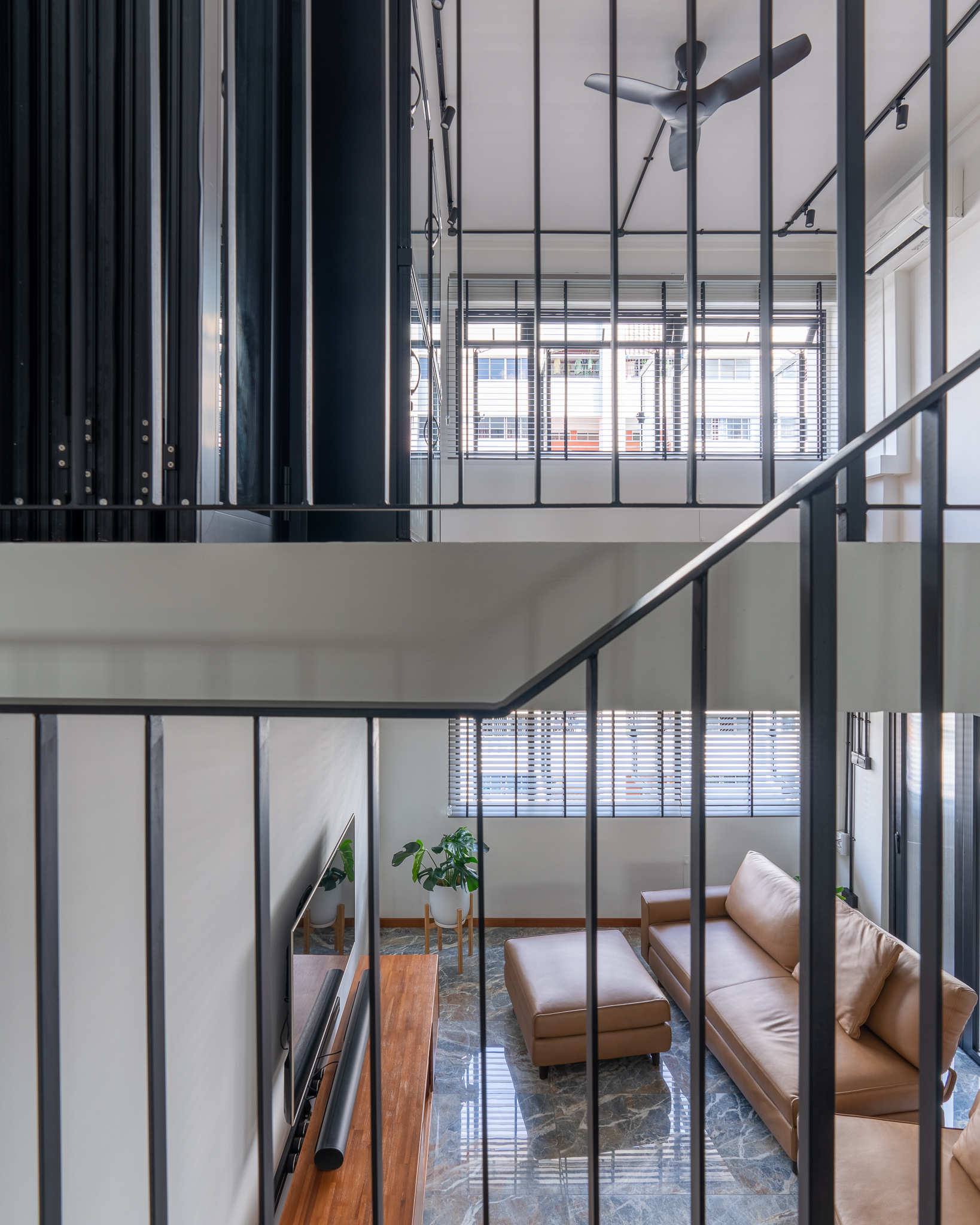 An executive maisonette, deconstructed and reassembled - Modern living room interior, minimalist design, large windows, black