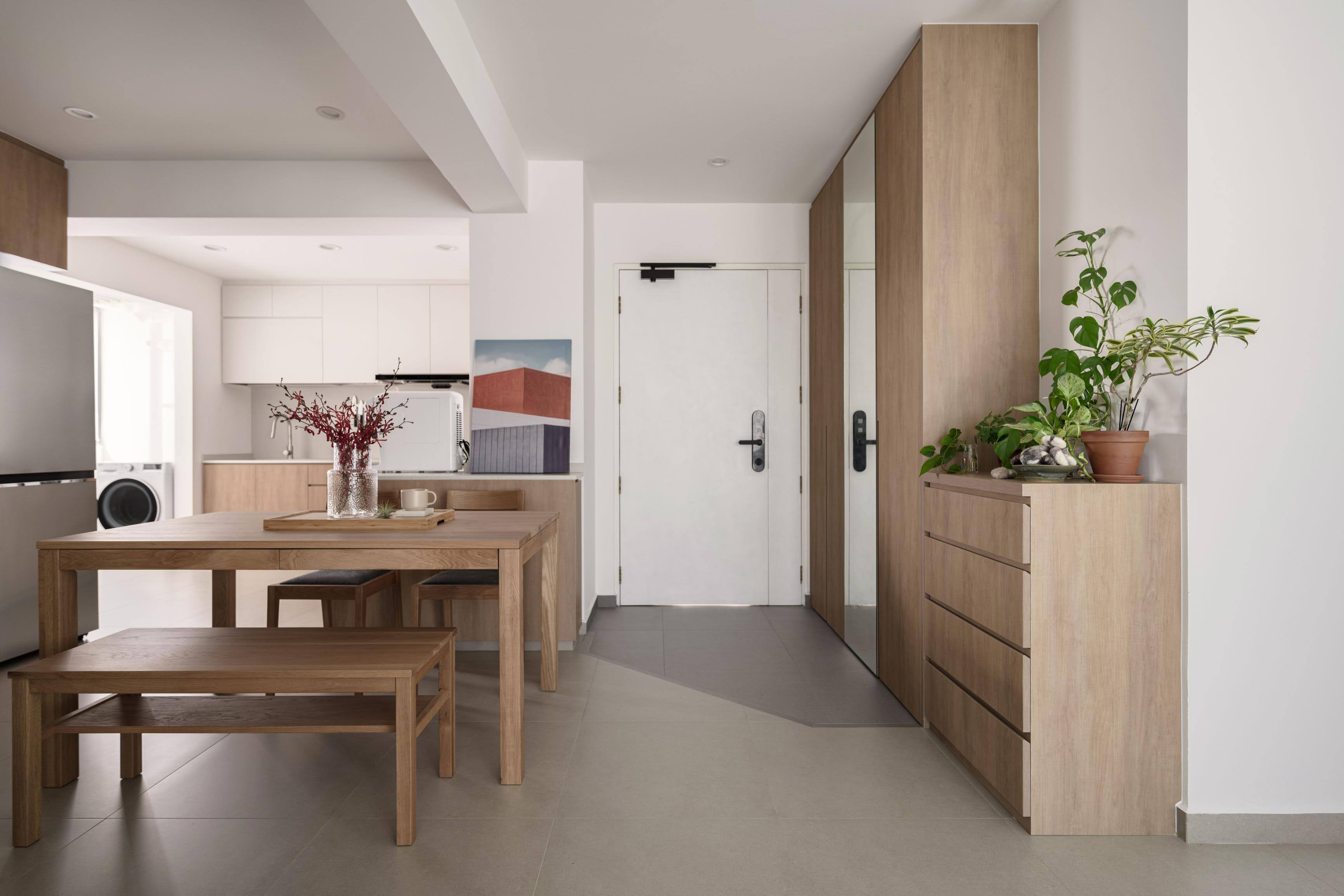 Our Calm and Cozy Japandi-themed Home - Modern kitchen with wooden furniture, minimalist design, clean lines, neutral color