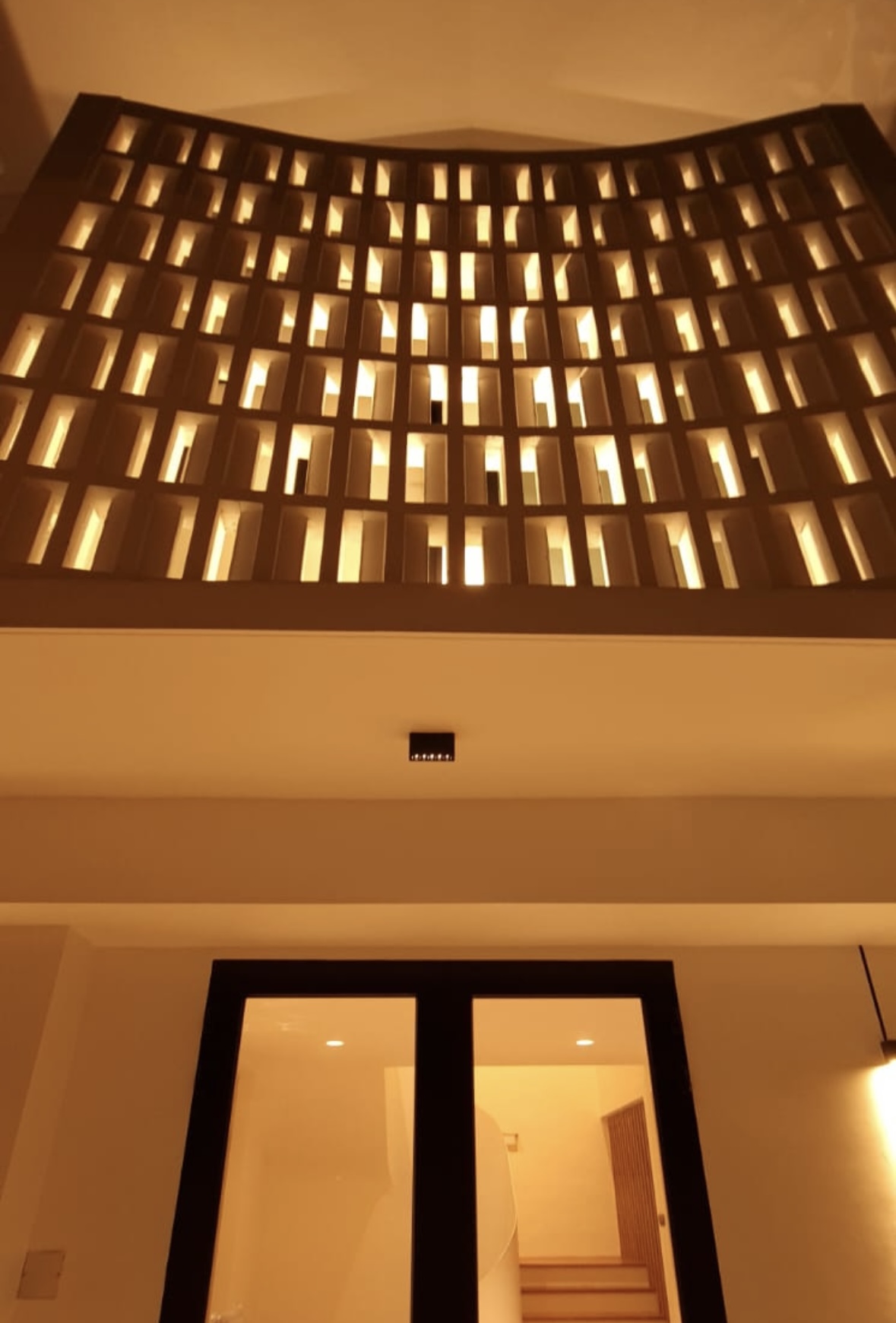 60’s grilles in a newly constructed house - Modern architectural design, illuminated interior, geometric pattern, warm