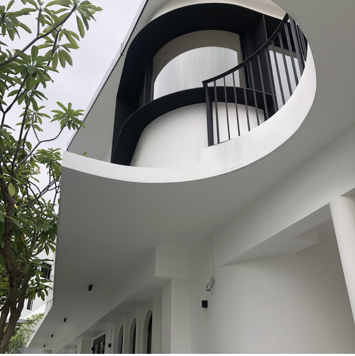60’s grilles in a newly constructed house - Modern architectural design, minimalist aesthetic, sleek curves, black and white