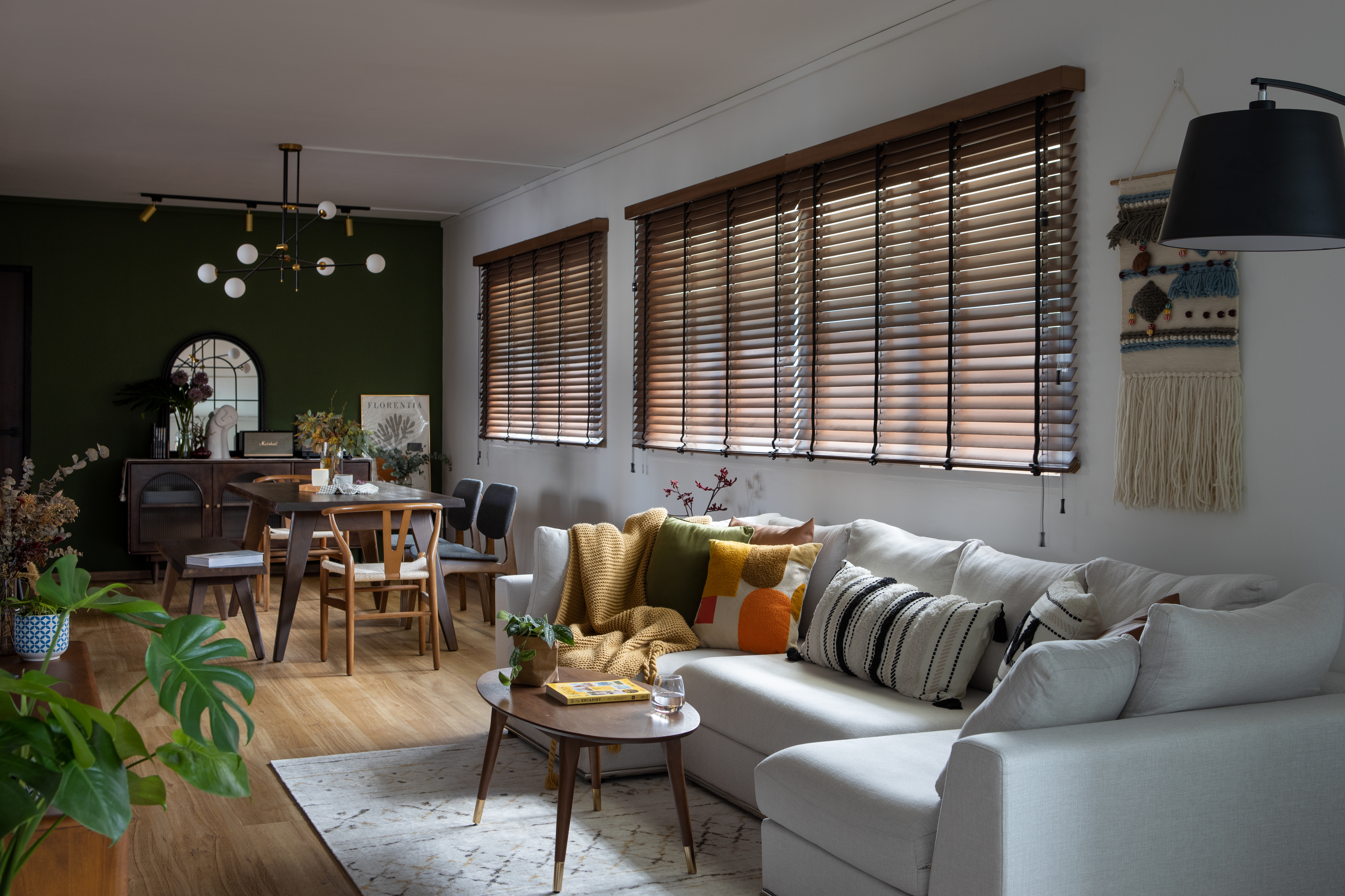 Our Mid-century Modern Inspired 4-rm Resale Flat - Modern living room with cozy furniture, wooden floors, and a dining area