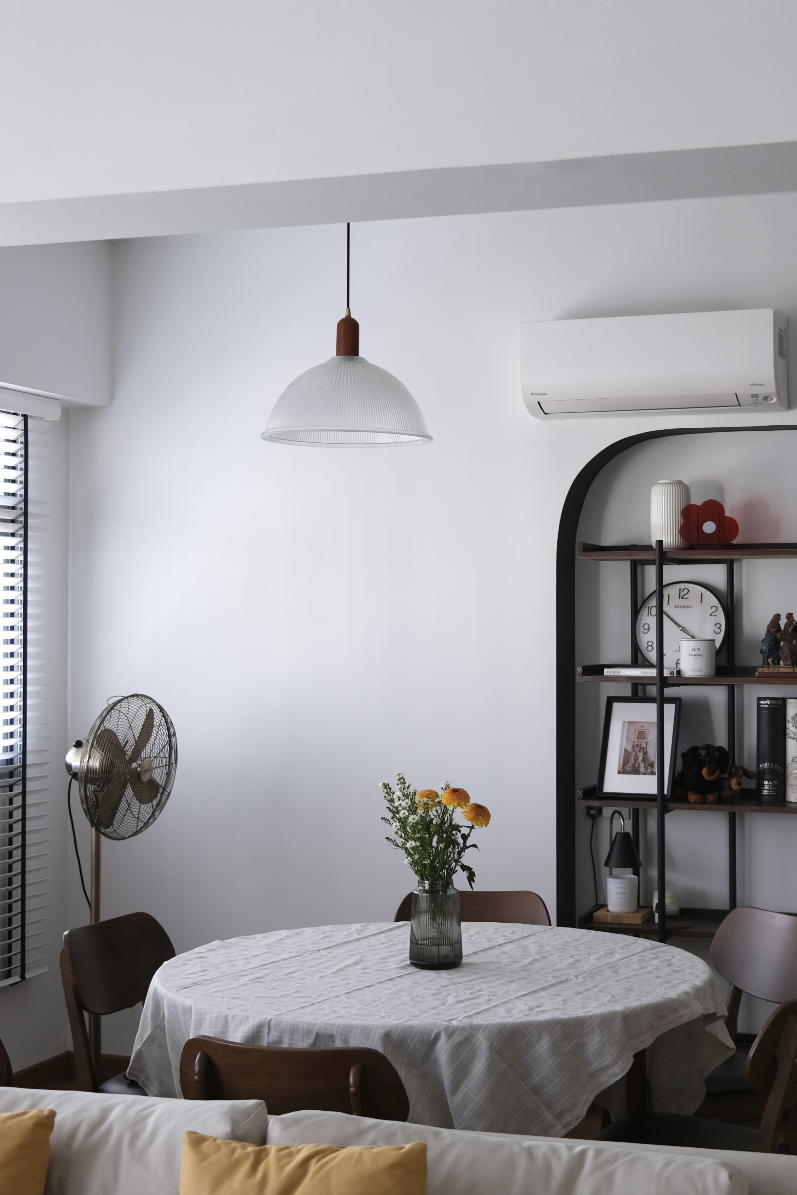Our Mid-Century Modern home | Renovated under 40k  - Modern dining room with white walls, minimalist furniture, round table