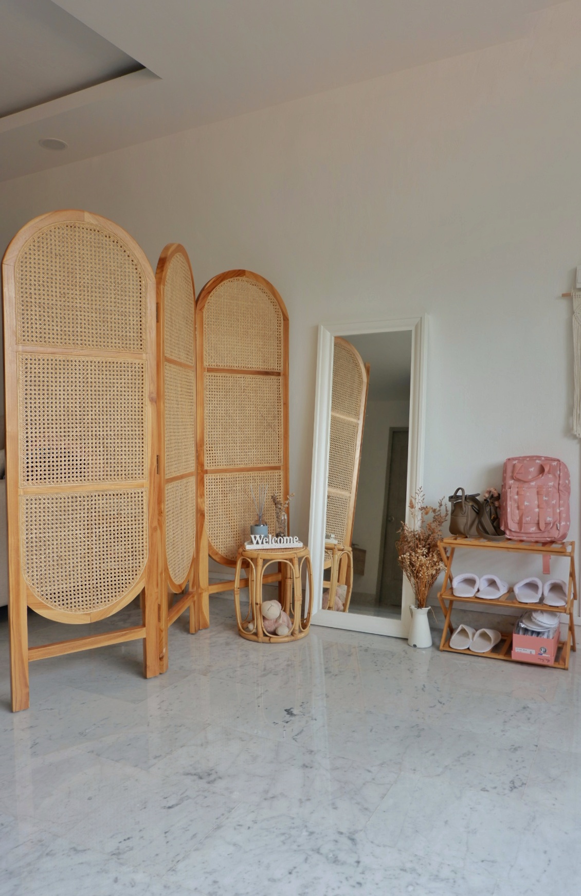 Bring Cafe Charm Into Our Home - Woven bamboo furniture, minimalist decor, wooden chairs, large mirror, marble floor, natural