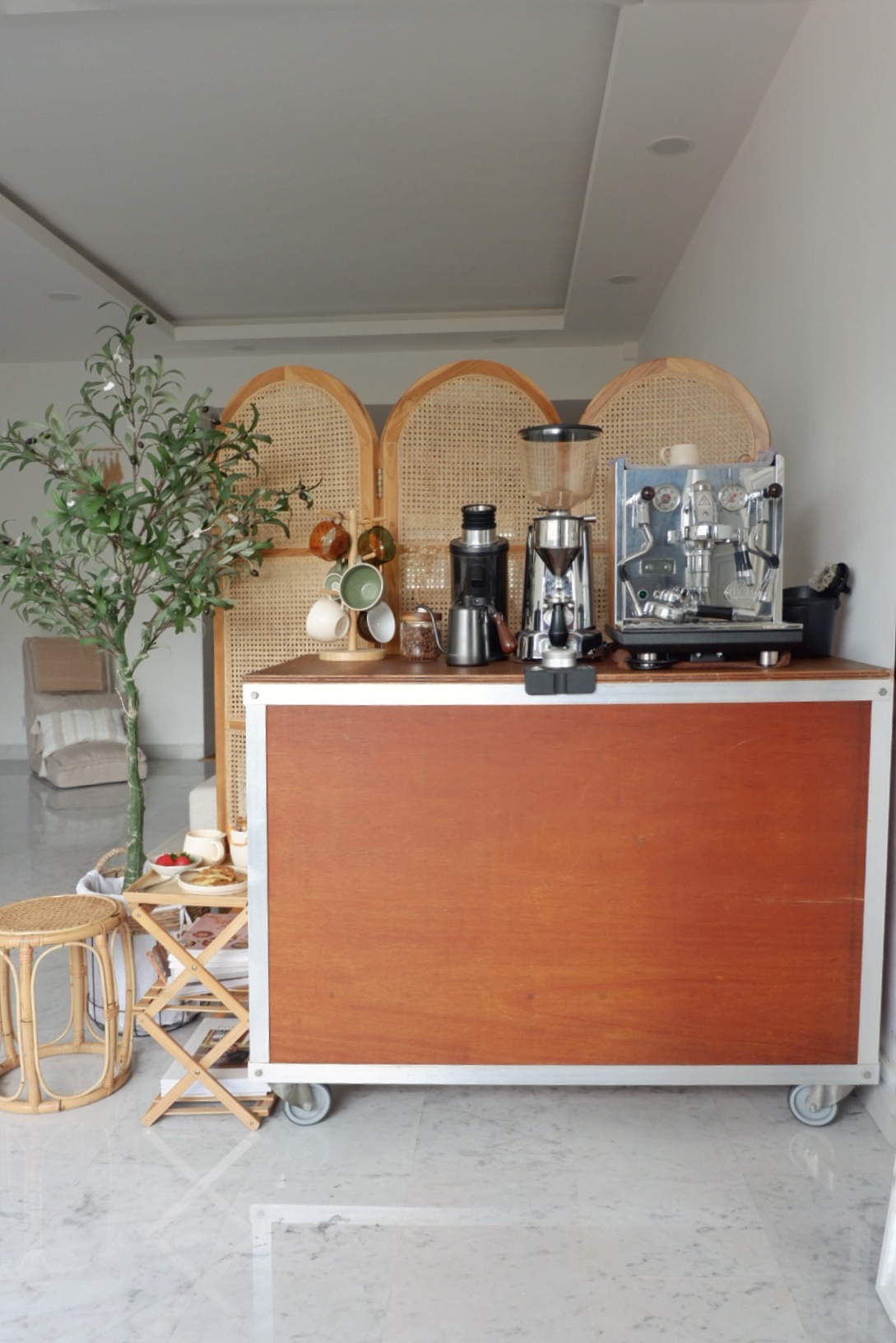 Bring Cafe Charm Into Our Home - coffee station, modern kitchen, espresso machine, wooden counter, wicker chairs, plant