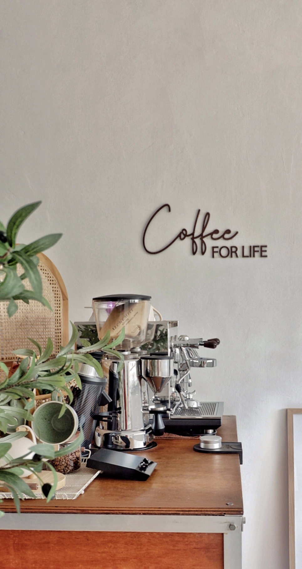 Bring Cafe Charm Into Our Home - Coffee, barista, espresso machine, coffee beans, fresh green leaves, wooden countertop