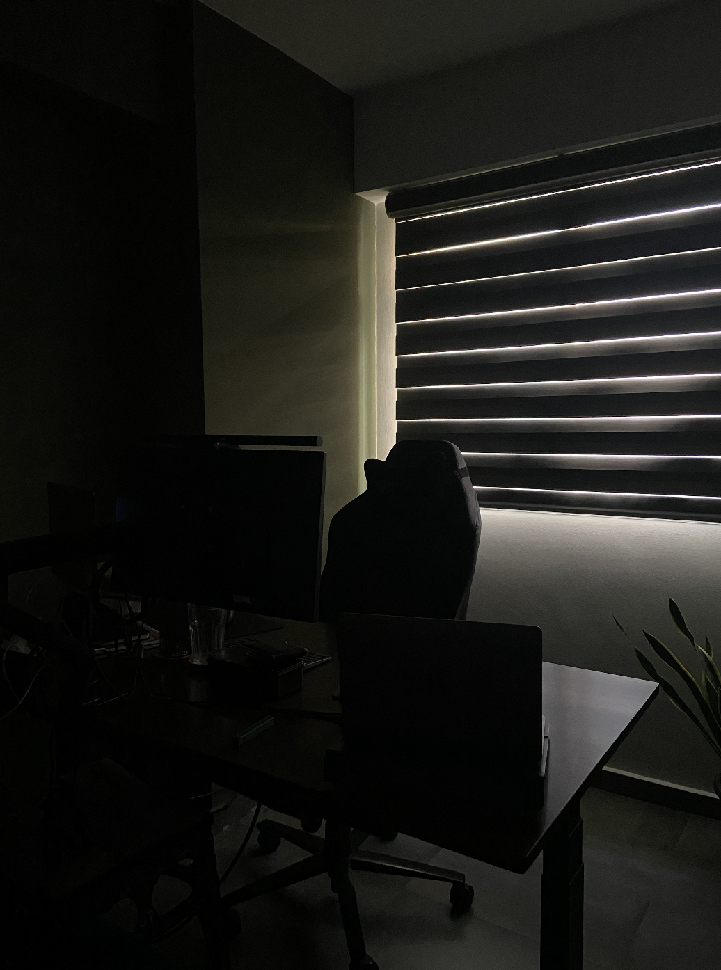 Slow living @slow.ferns - dimly lit workspace, modern office, black office chair, dual monitors, workspace setup, computer