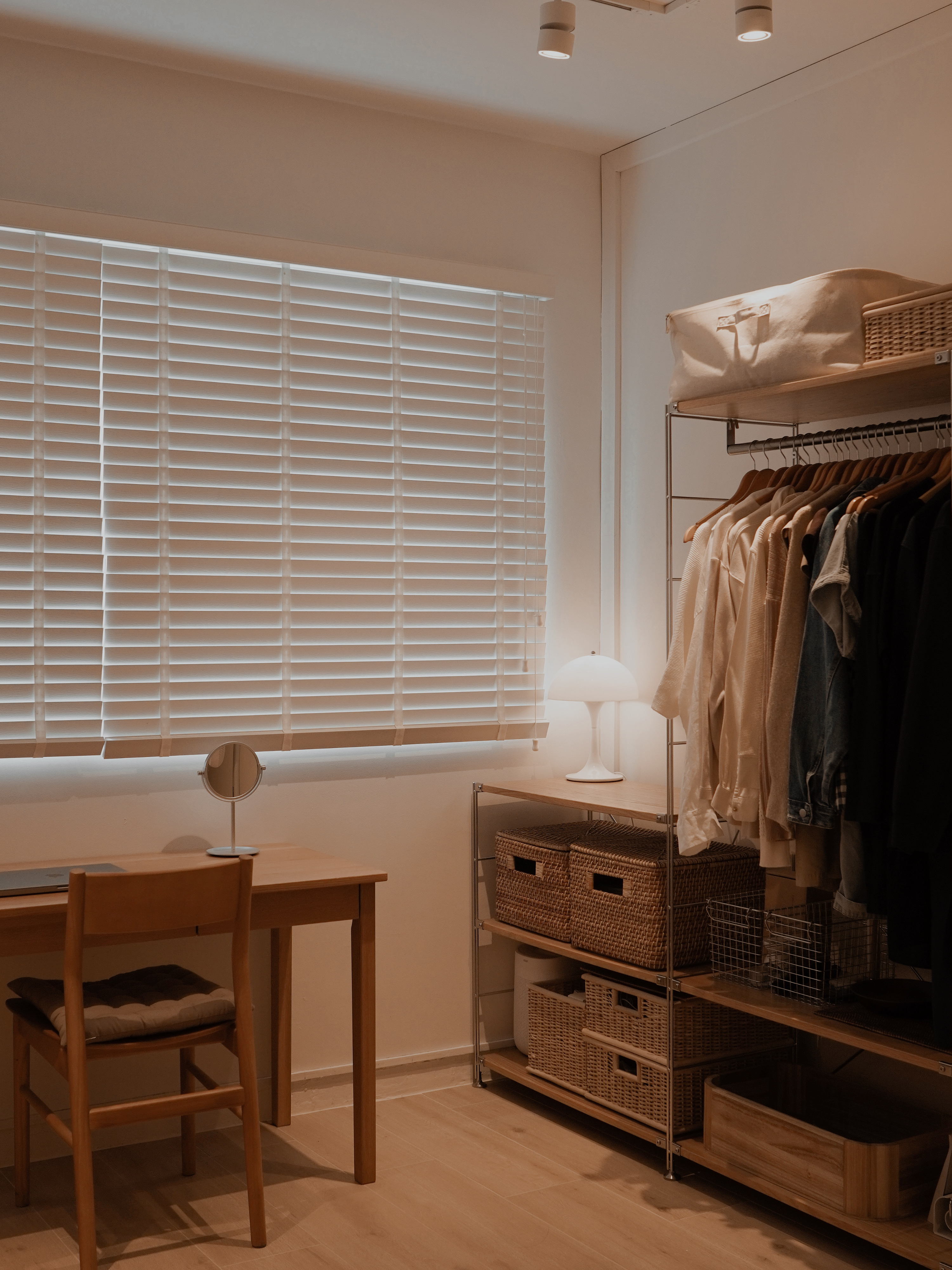 Day to Night Comfort Routine in a Cozy Room - Wooden desk, minimalist design, soft lighting, window with blinds, round
