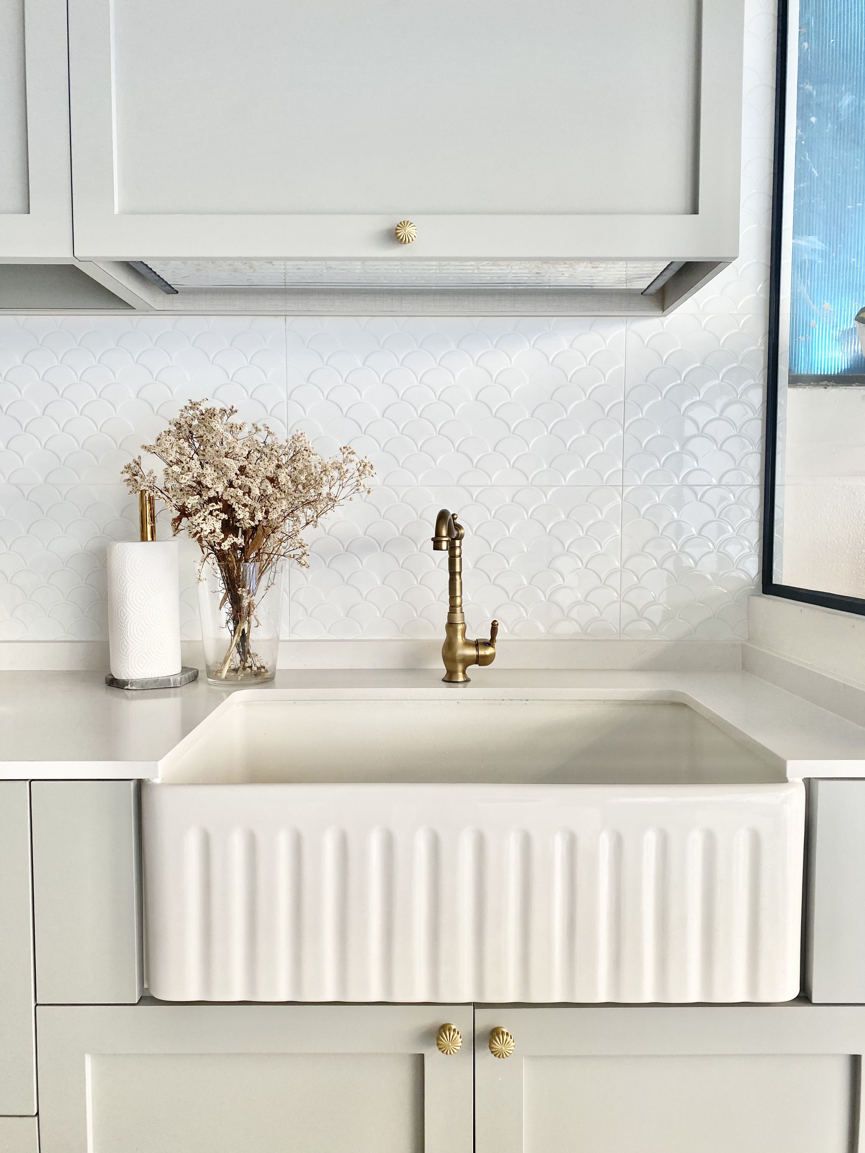 A Black & White Scandi, Peranakan and Colonial-inspired Inter-terrace - White kitchen countertop, minimalist design, elegant