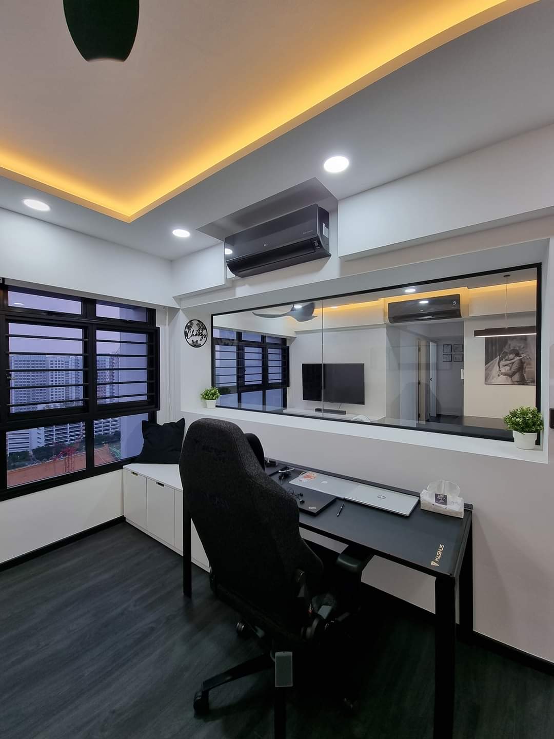Our Beautiful Black & White - Modern workspace, sleek desk, black office chair, large window, indoor plant, minimalist decor