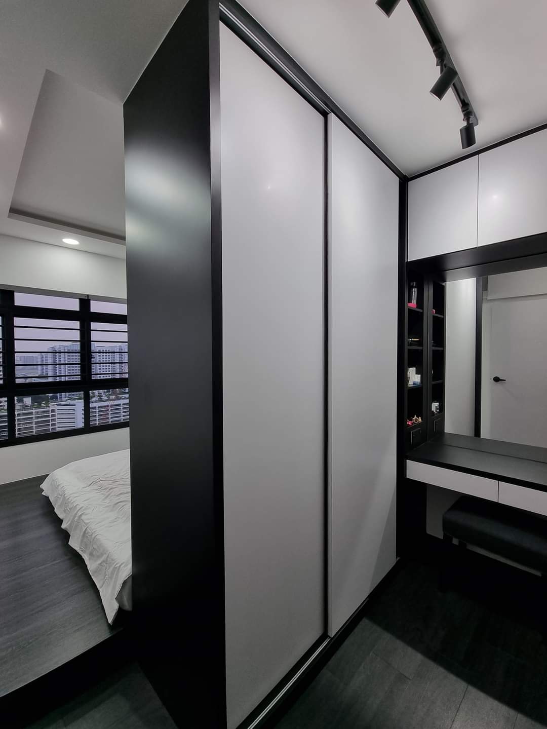 Our Beautiful Black & White - Modern bedroom with sleek black and white color scheme, minimalist design, large bed with white