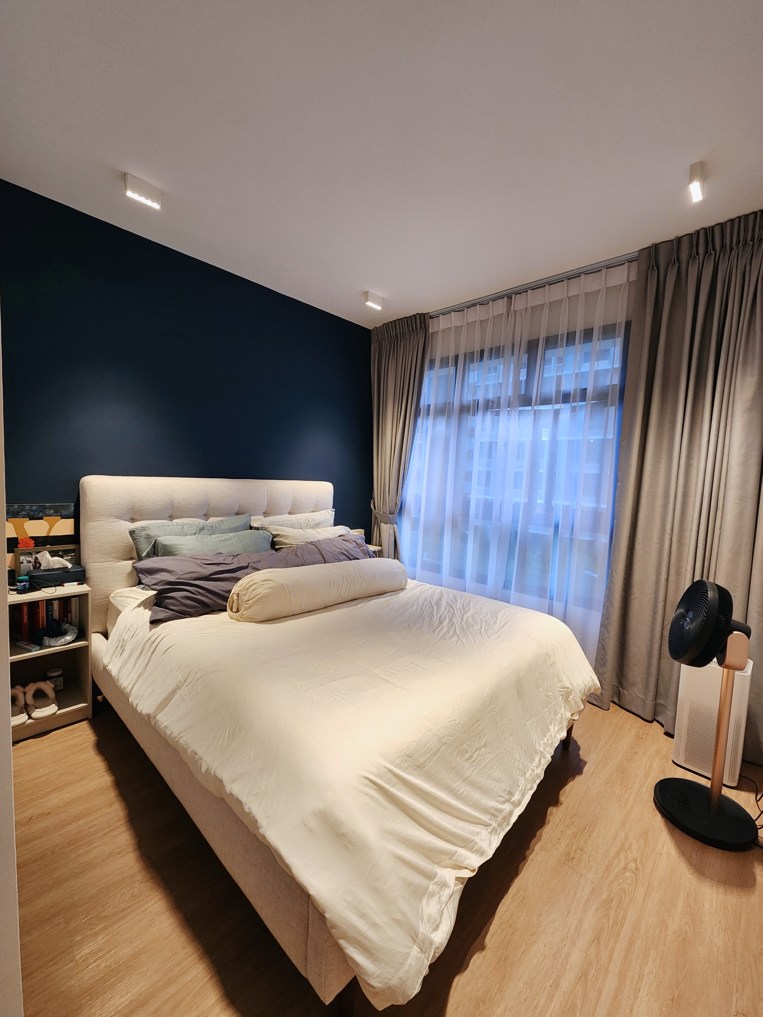 It's a dream come true! Walk in Wardrobe in a 4-rm BTO Masterbedroom - Modern bedroom with large bed, beige bedding, dark
