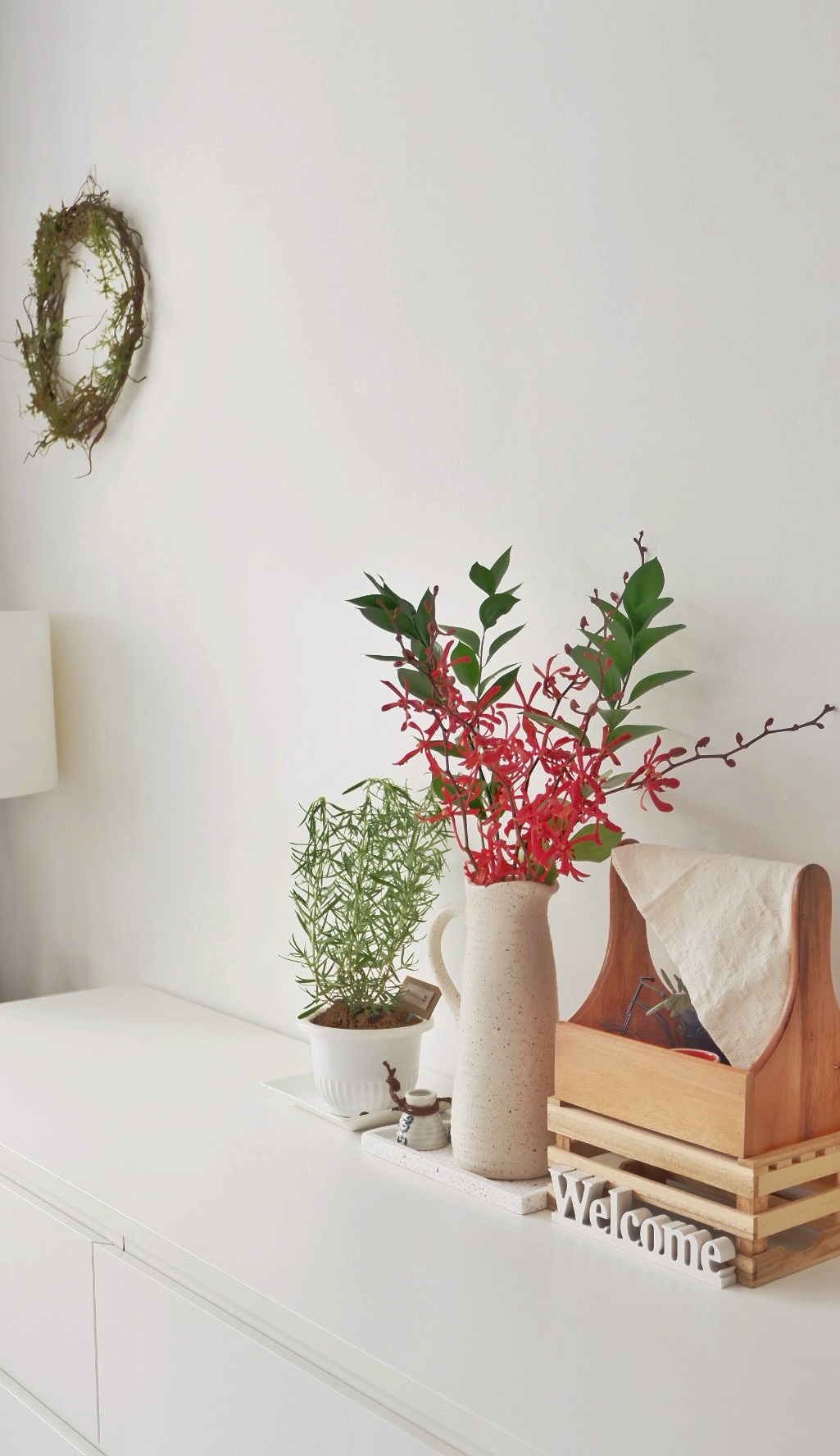 Home styling ideas - just the way you like! - White minimalist decor, greenery, potted plants, red flowers, wooden tray