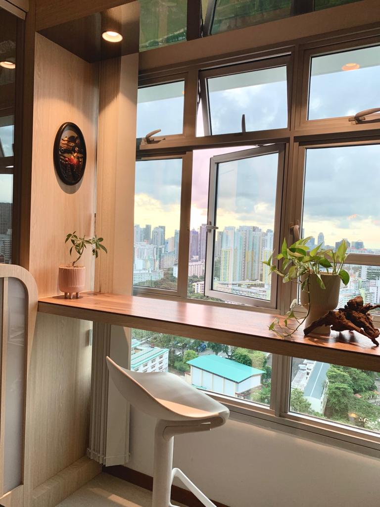 Japanese Inspired Interior | Minimal plants with impact  - Wooden window sill, potted plants, cityscape view, modern