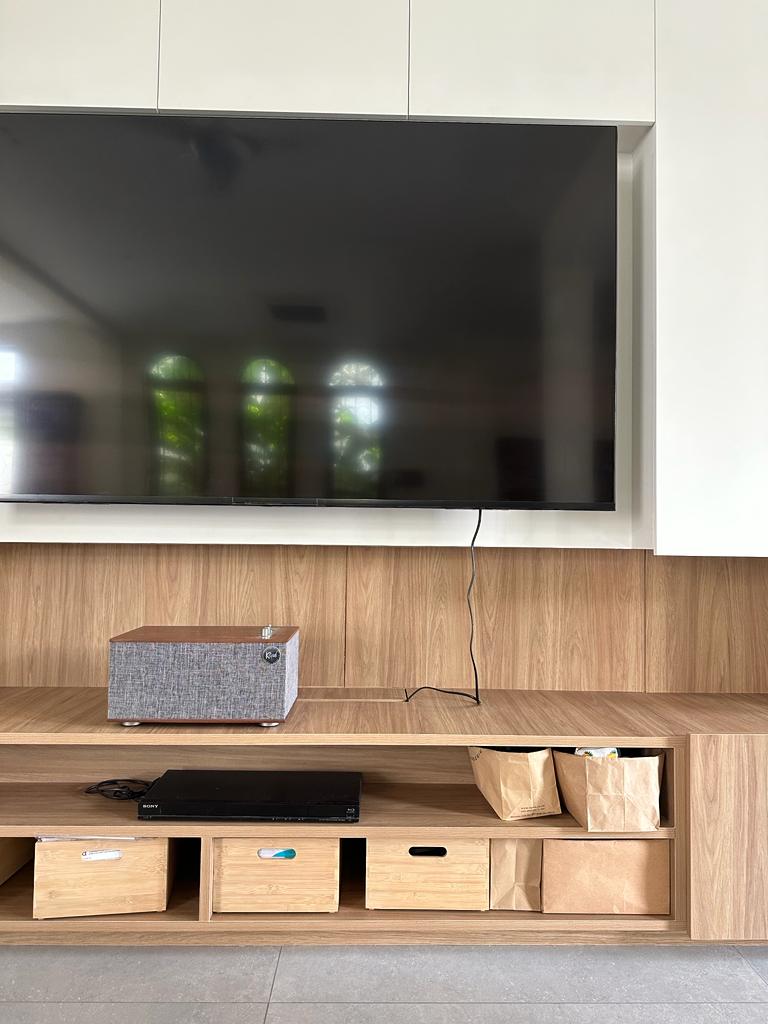 Living in simplicity where less is more - Modern minimalist living room, sleek entertainment center, wooden shelves