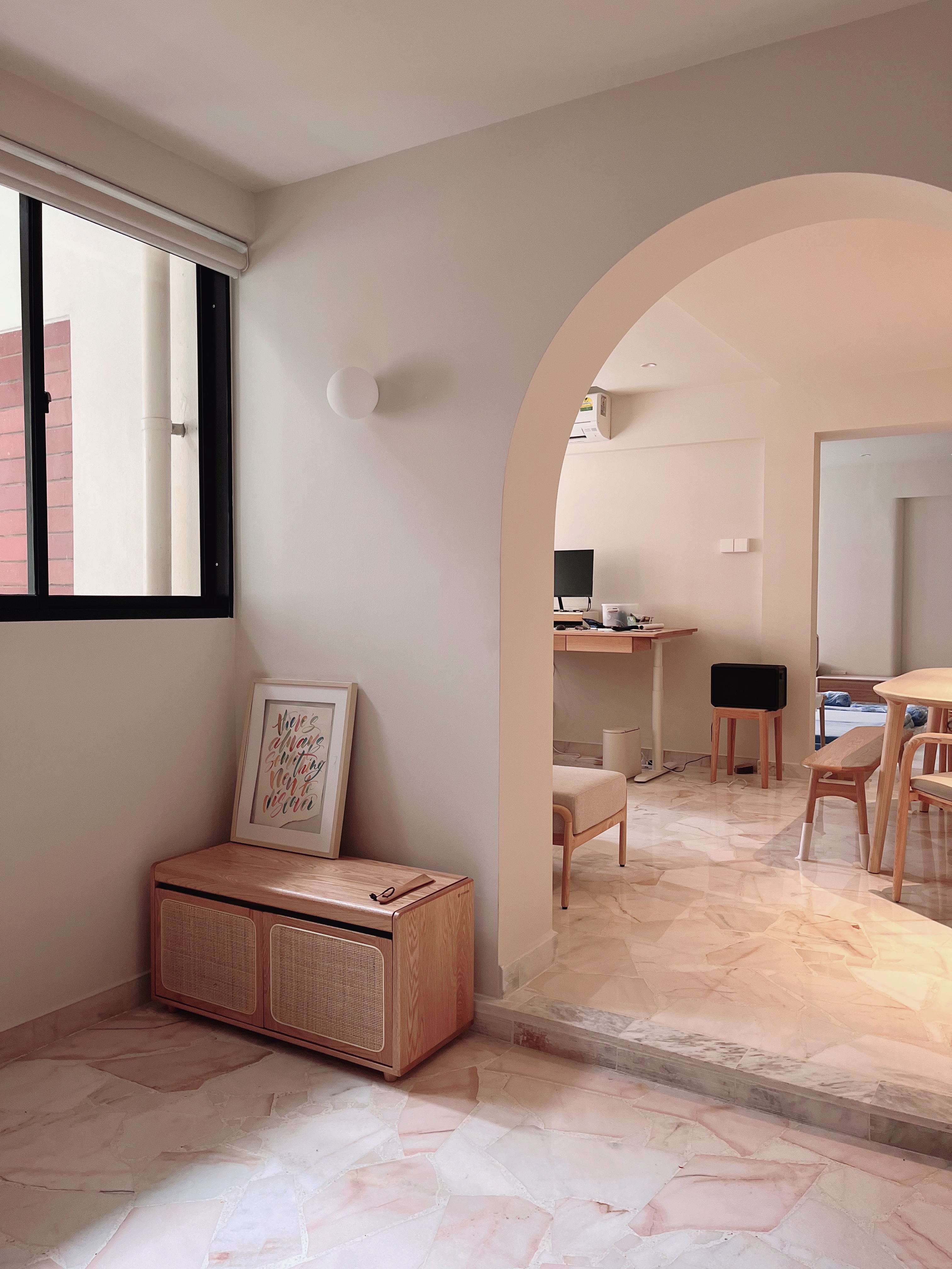 A warm and spacious foyer with a functional twist