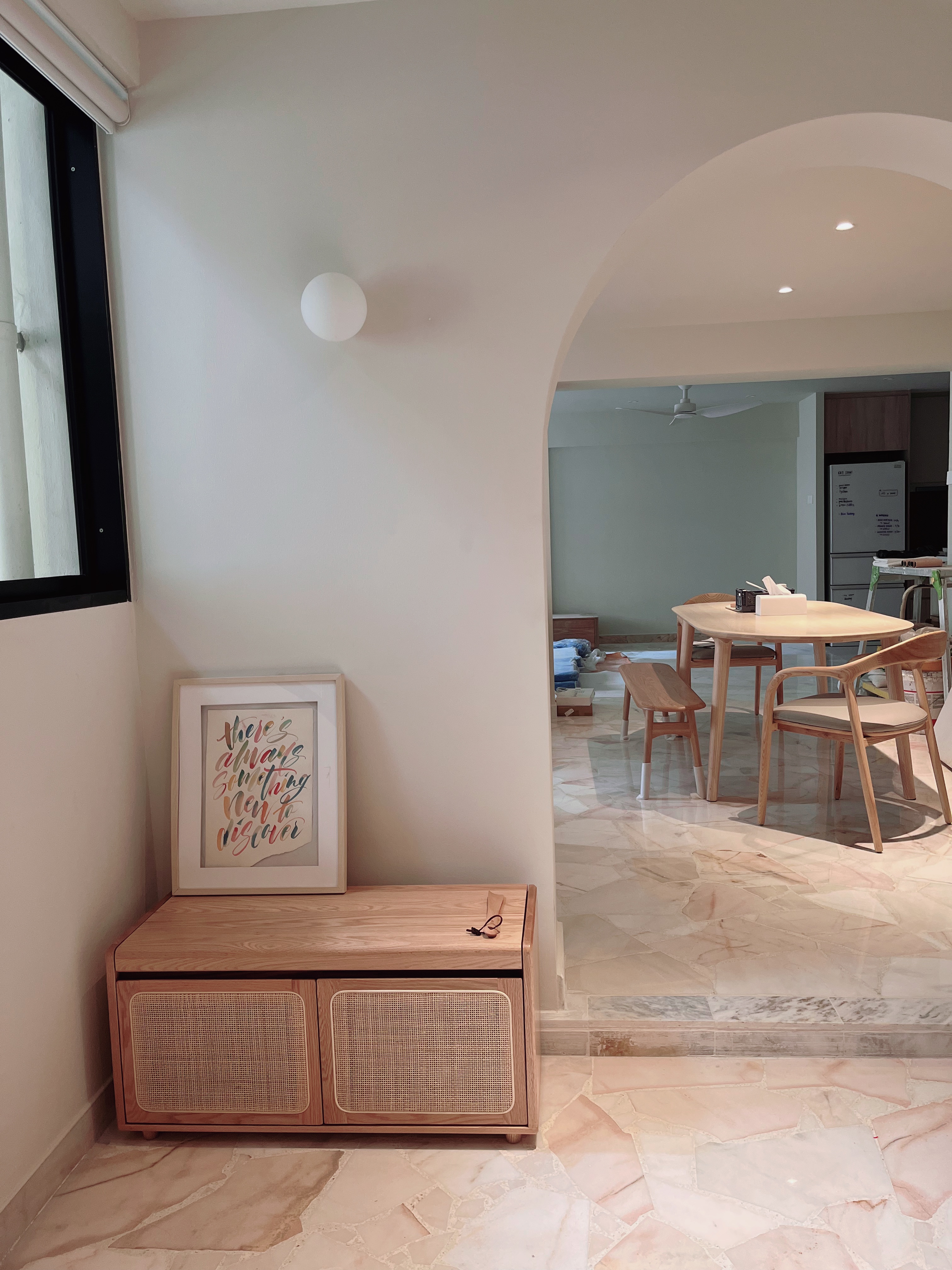 A warm and spacious foyer with a functional twist