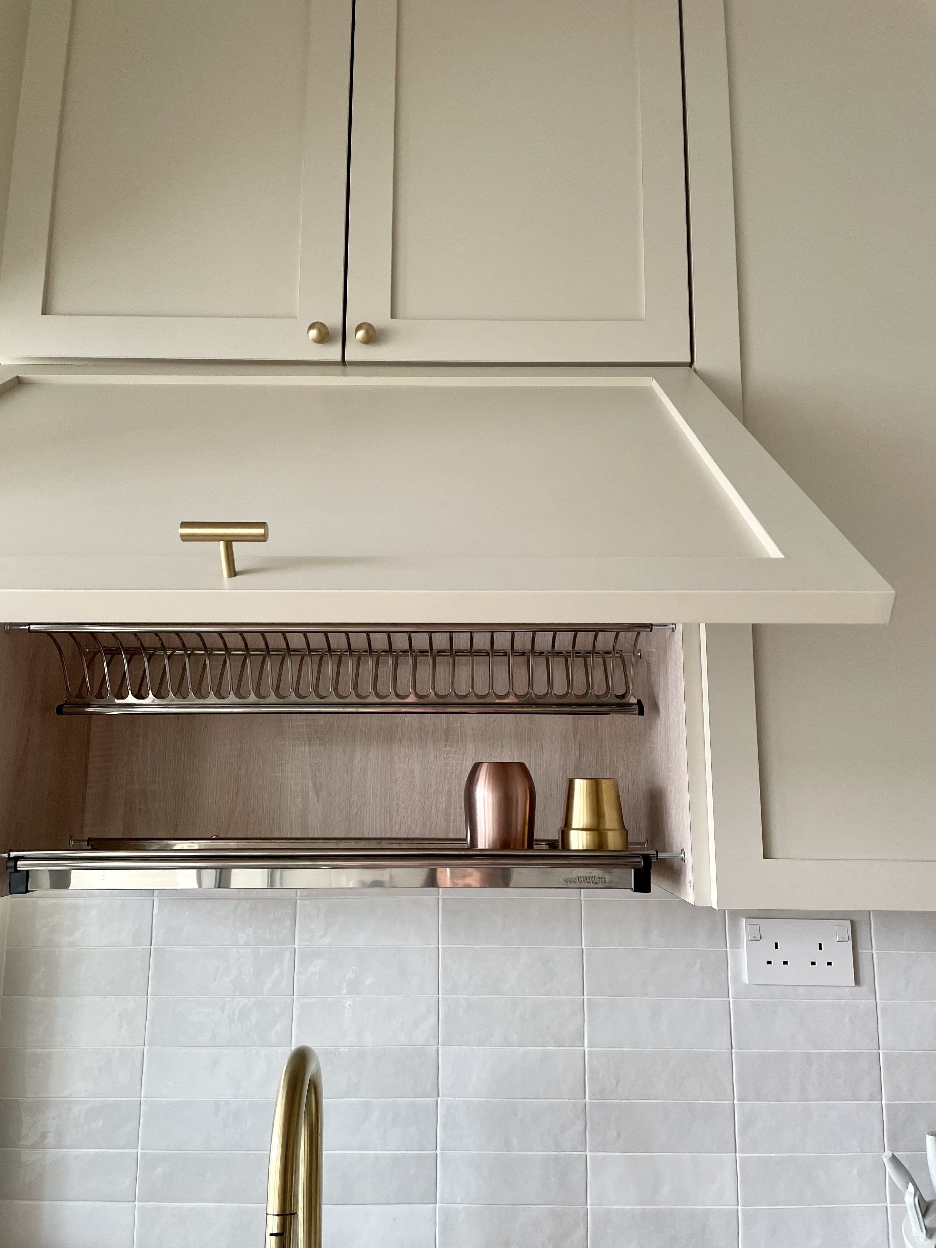 Dream Farmhouse Kitchen in small BTO - White kitchen cabinets with gold handles, stainless steel range hood, copper and gold