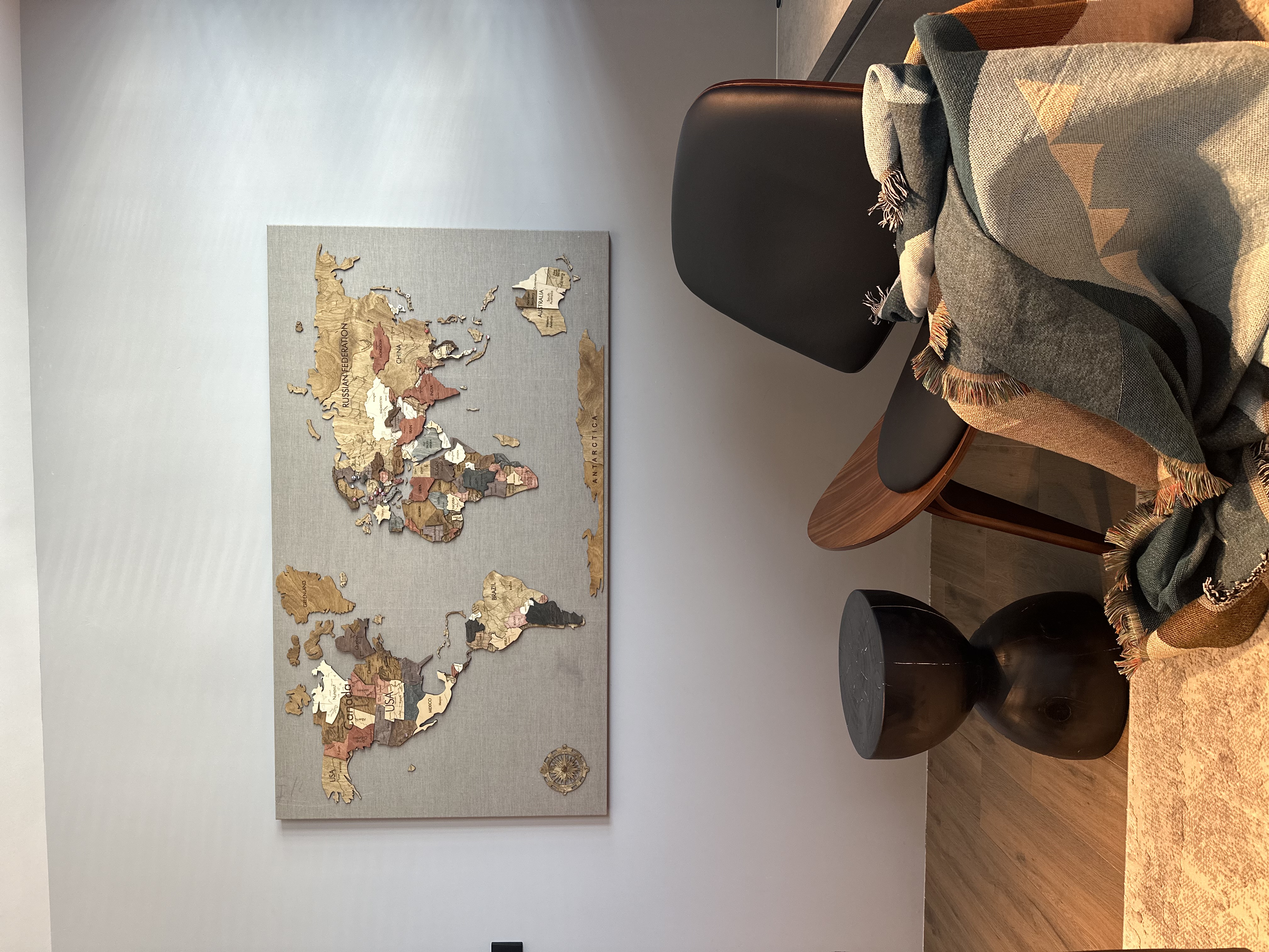 Styling tips and tricks for our modern contemporary home - map, wall art, decorative piece, wooden frame, beige background