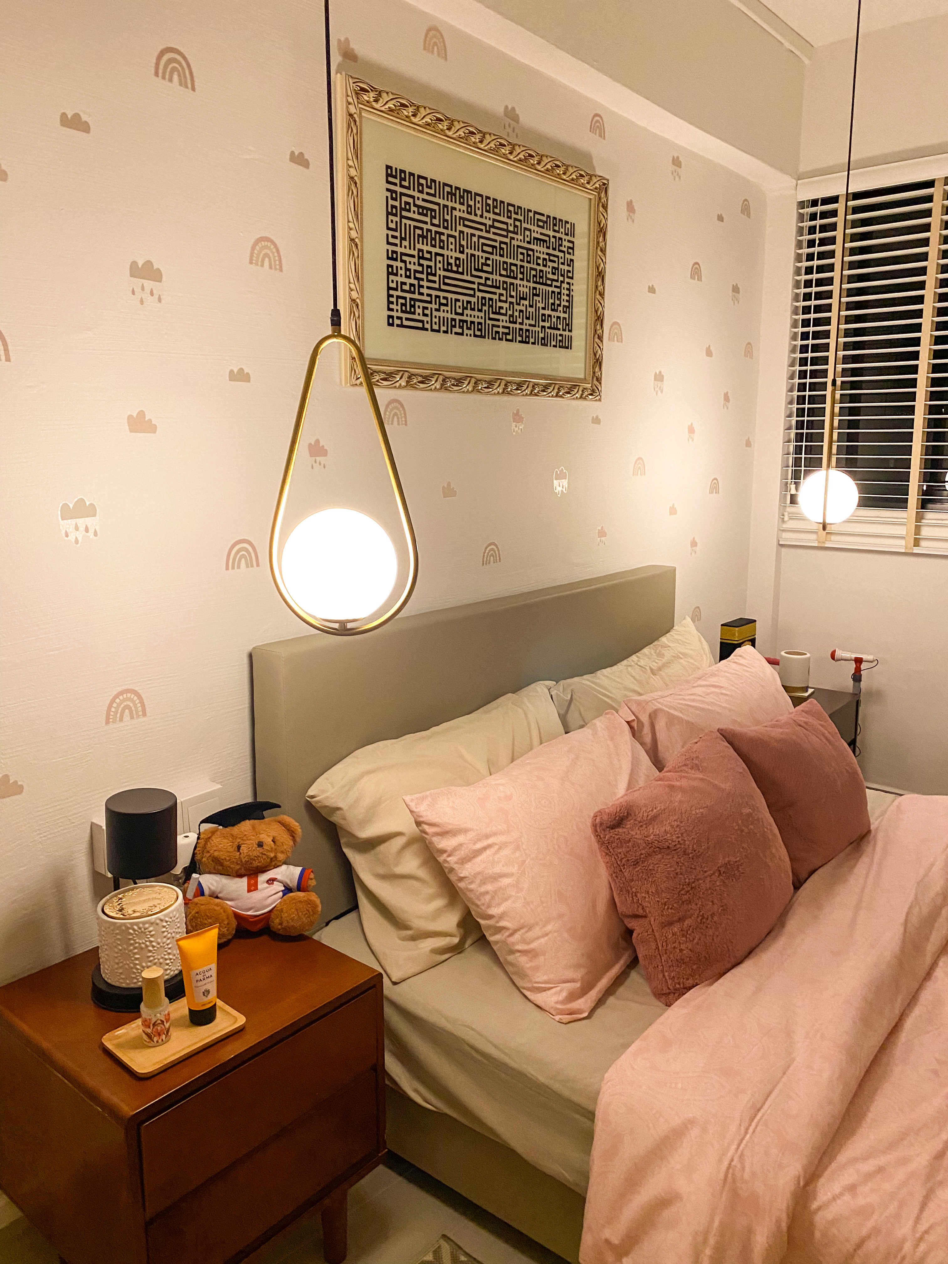 Day & Night of the new bedroom - Wallpaper with cloud and rainbow designs, modern pendant light, plush teddy bear, cozy bed