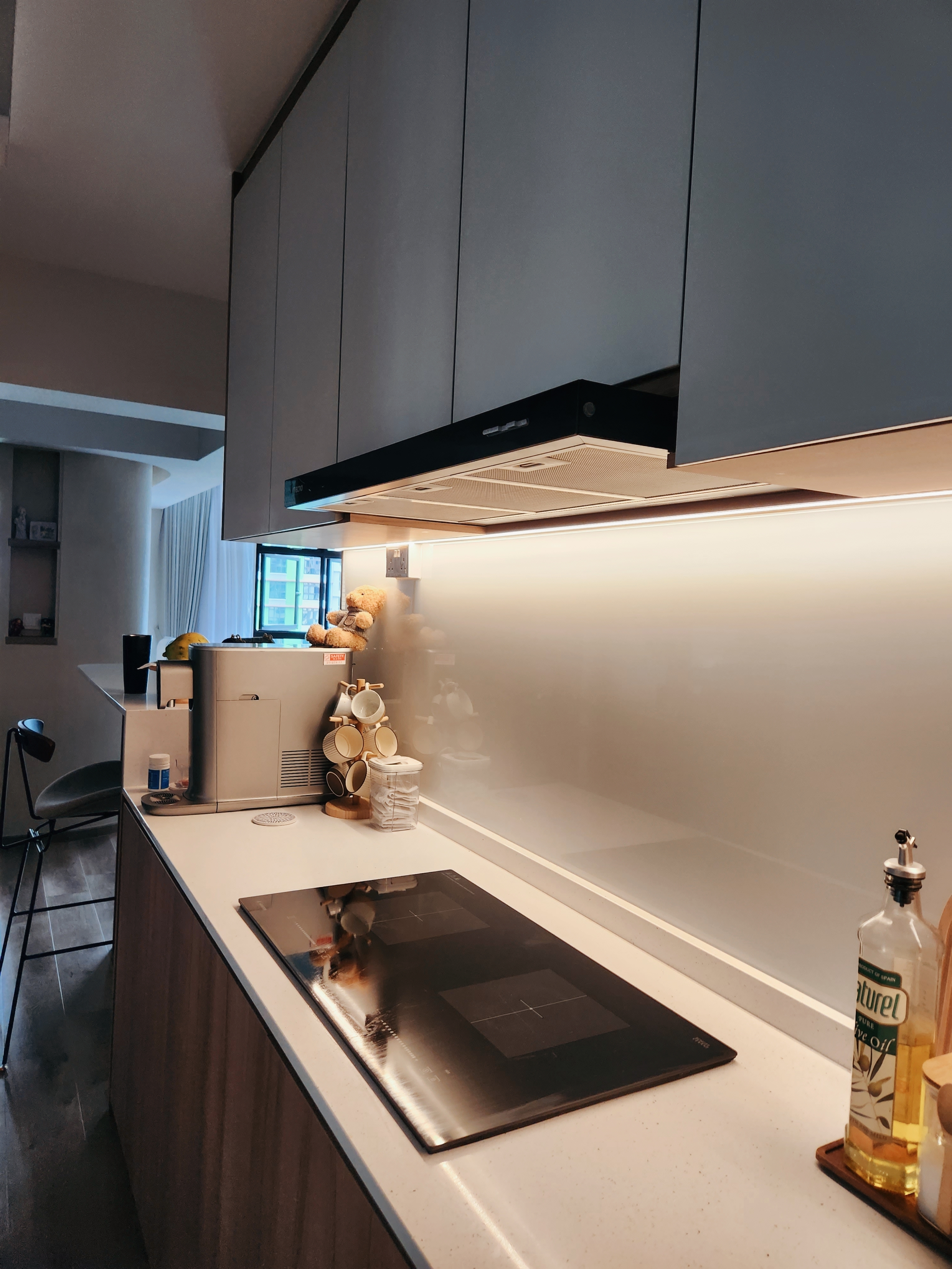 Open Concept Kitchen is the way to go - Modern kitchen with sleek cabinets, stainless steel appliances, and a minimalist
