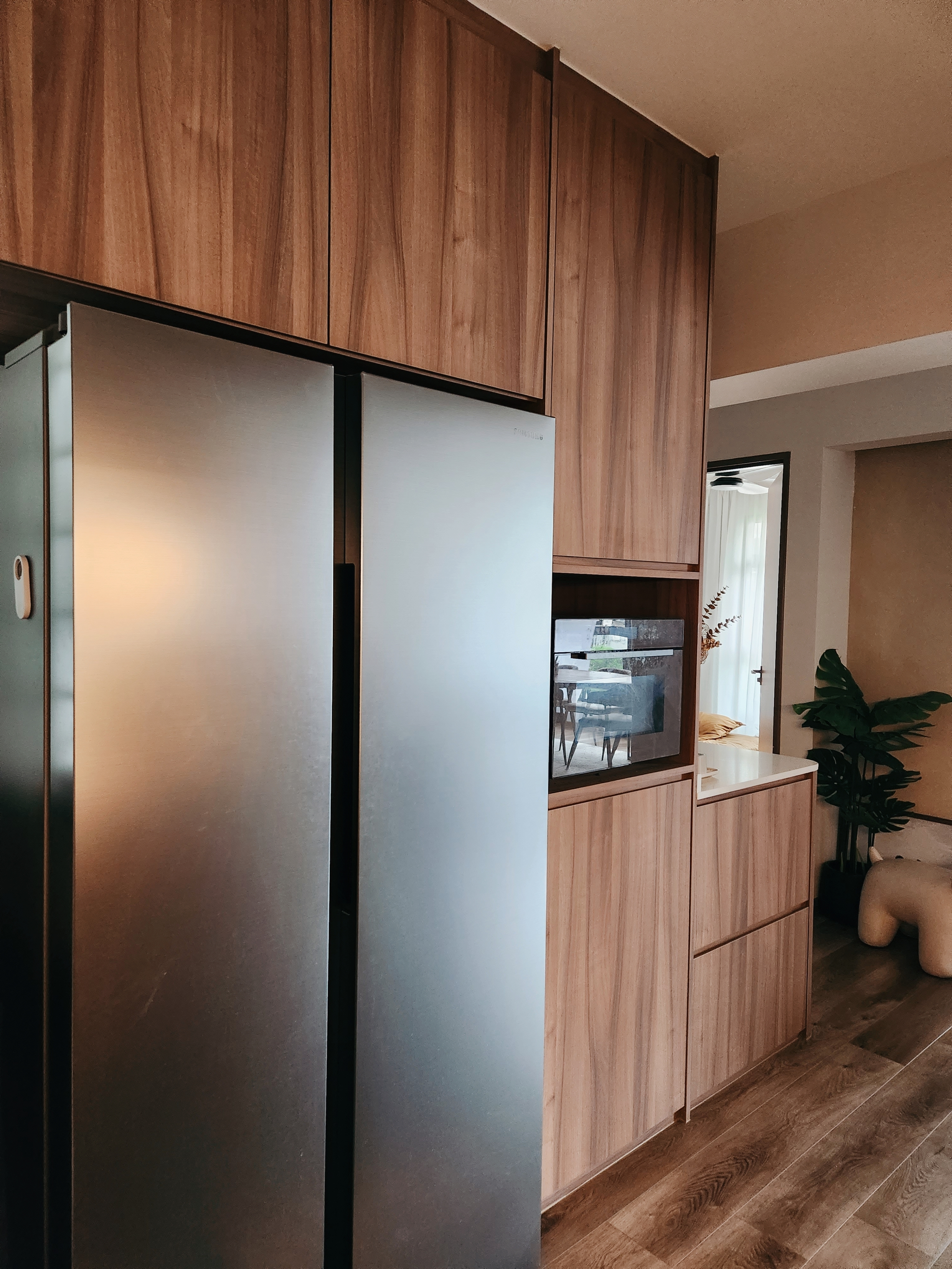 Open Concept Kitchen is the way to go - Wooden kitchen cabinets, stainless steel refrigerator, modern design, minimalist