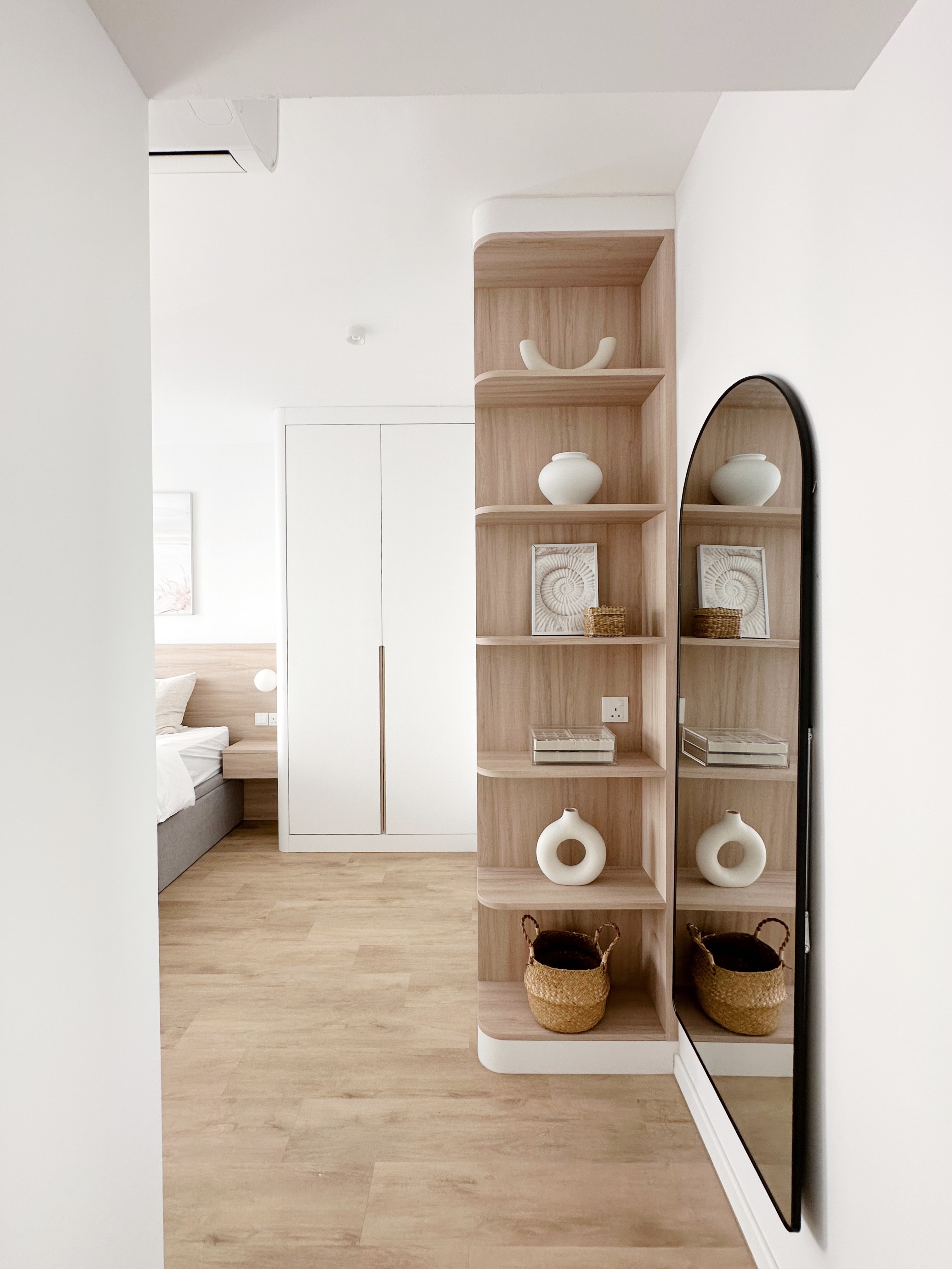 A Cosy Sanctuary: Our Dreamy Modern Coastal Bedroom - Wooden shelving unit, minimalist design, light wood finish, floating