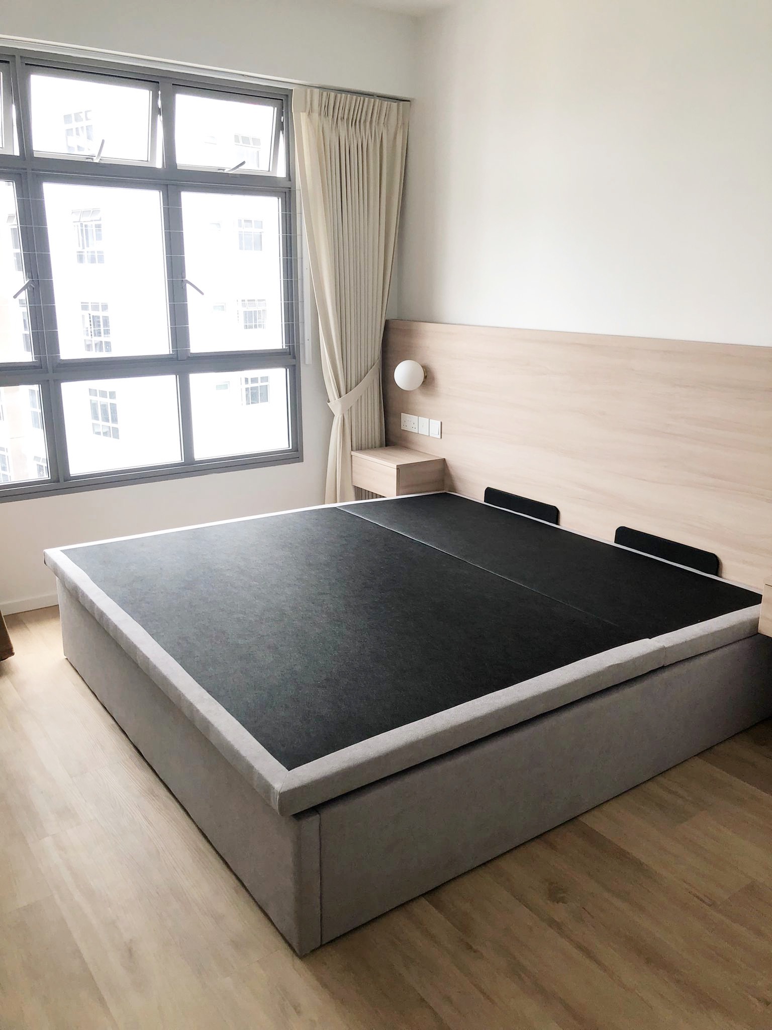 A Cosy Sanctuary: Our Dreamy Modern Coastal Bedroom - Modern minimalist bedroom, large window, beige curtains, wooden