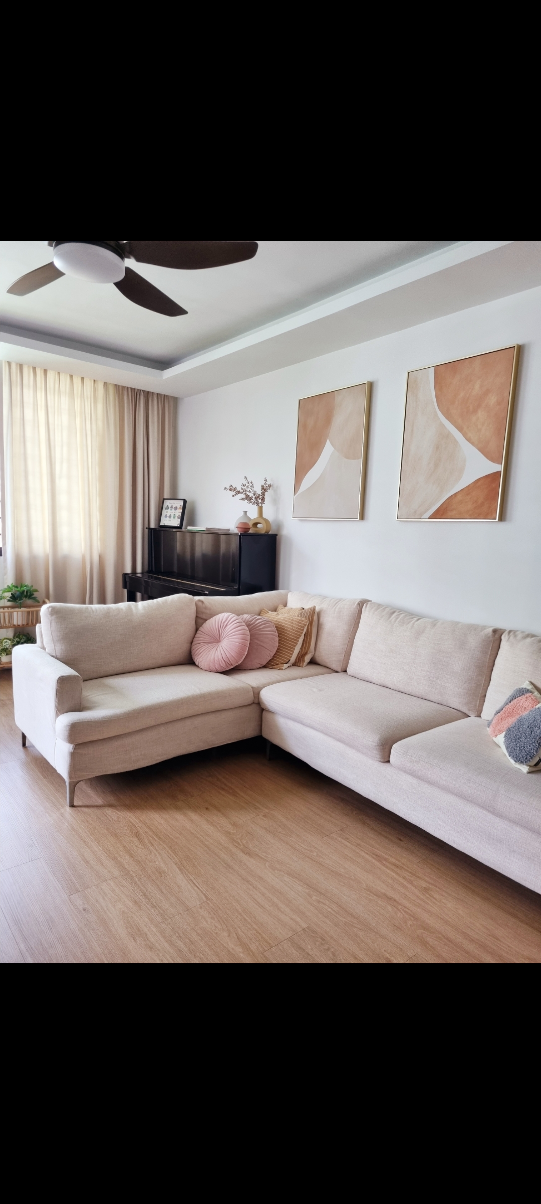 "Warming up" our living room with soft furnishings - Light beige sofa, minimalist decor, light wooden floor, elegant ceiling