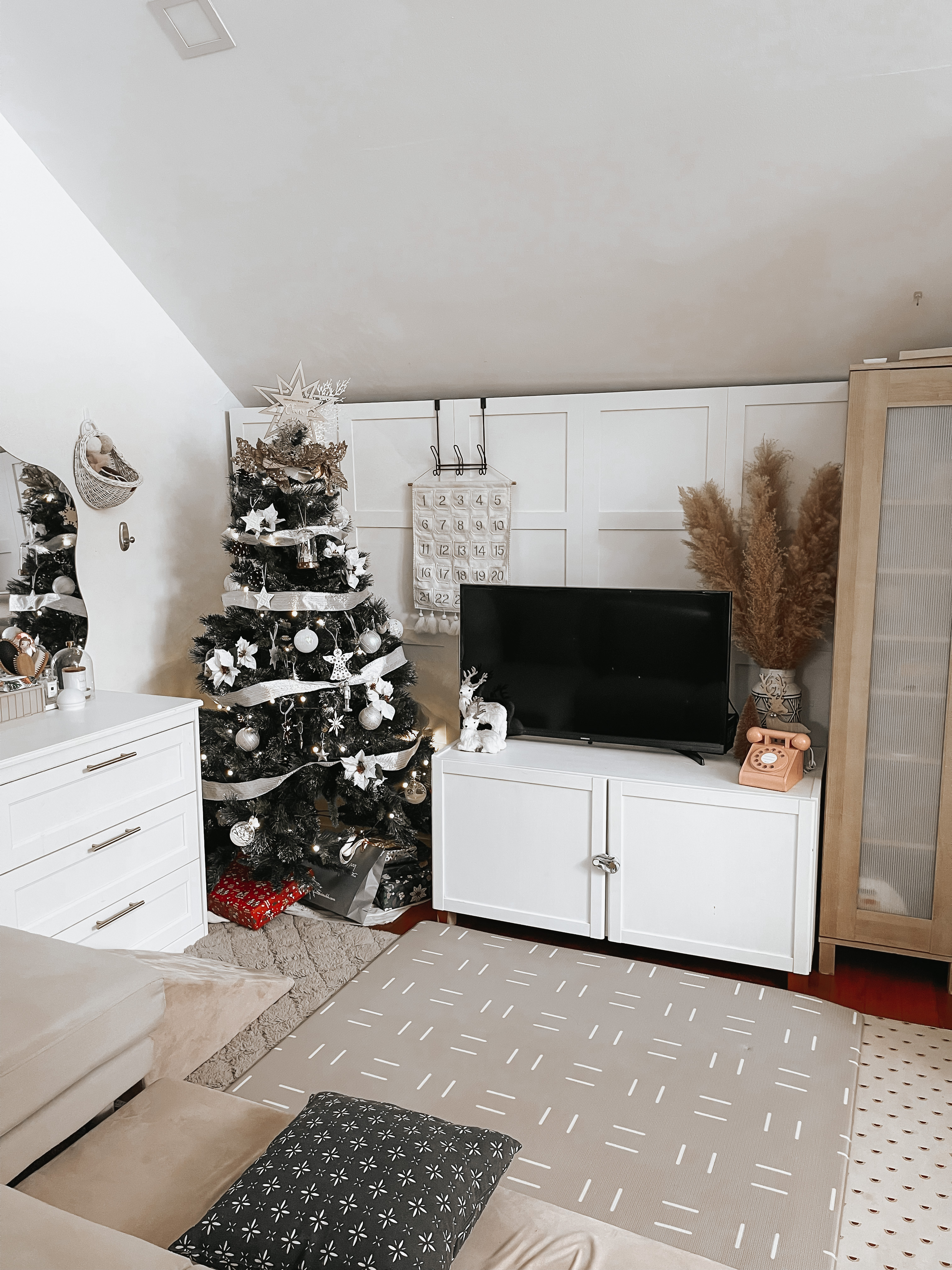 Living Room Makeover under $300 - Christmas tree, festive decorations, white walls, modern decor, cozy room, beige sofa